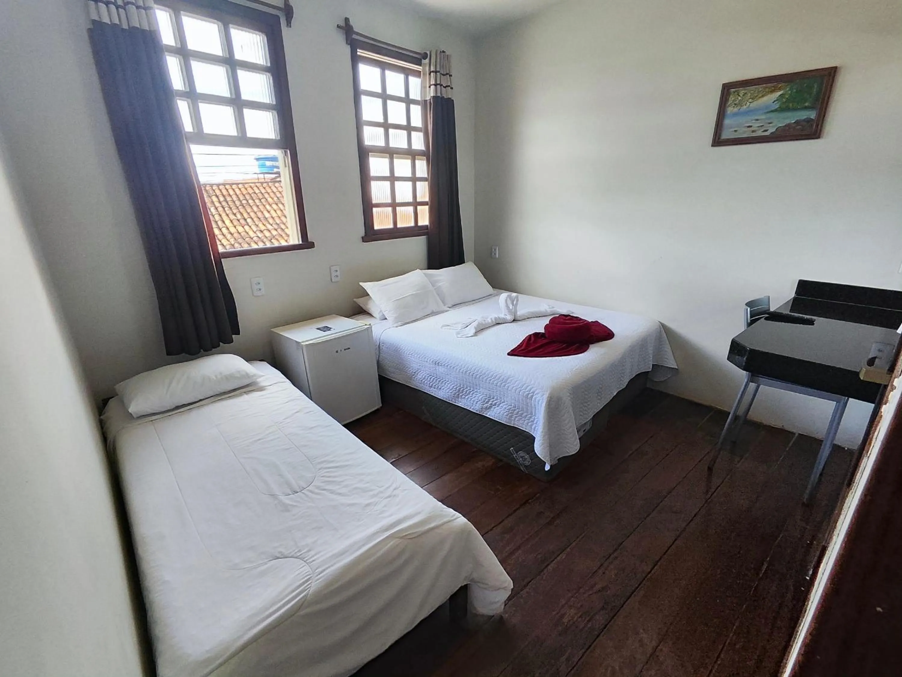 Bed in Pousada Flor de Lis