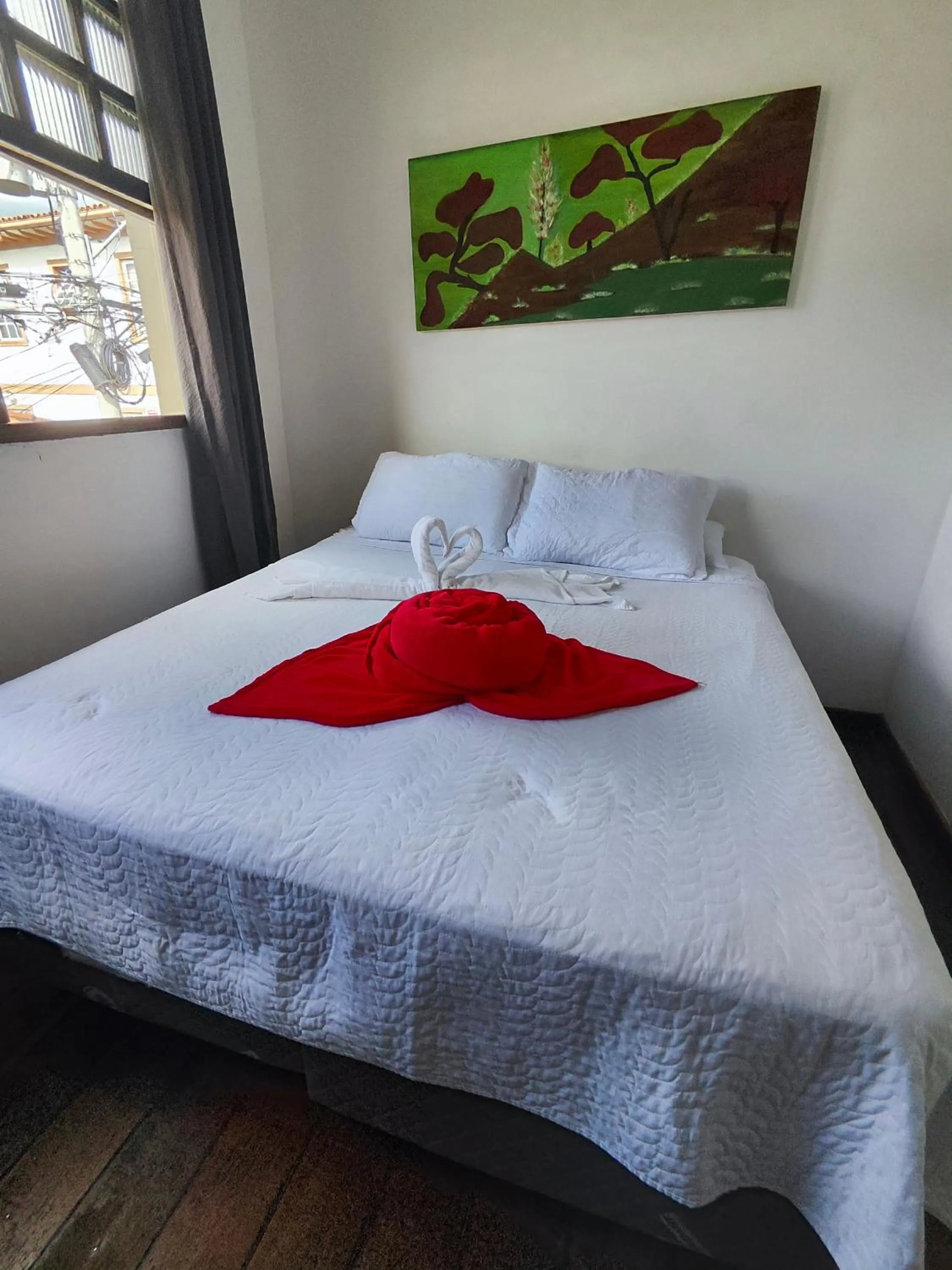 Bed in Pousada Flor de Lis