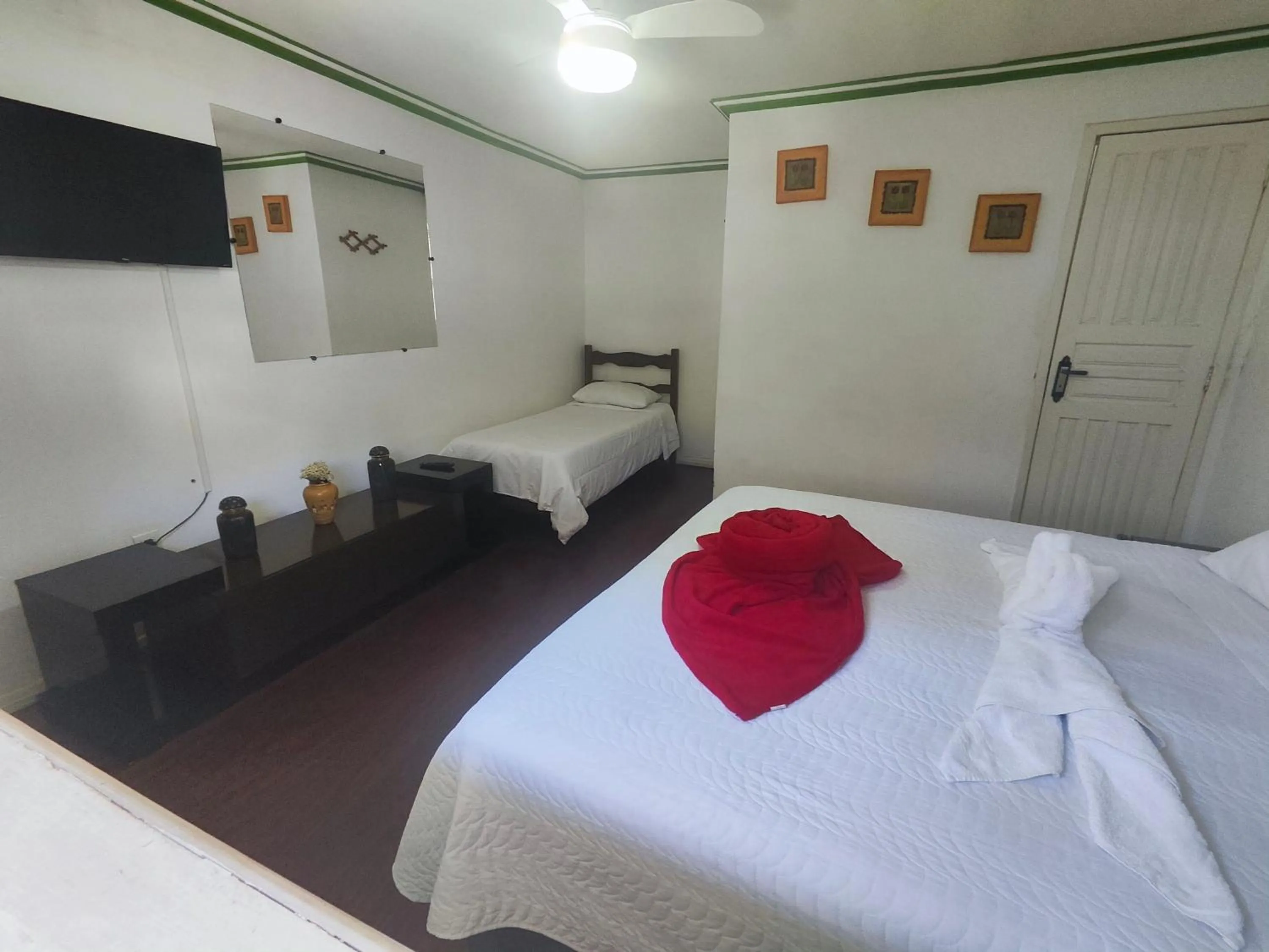 Bed in Pousada Flor de Lis