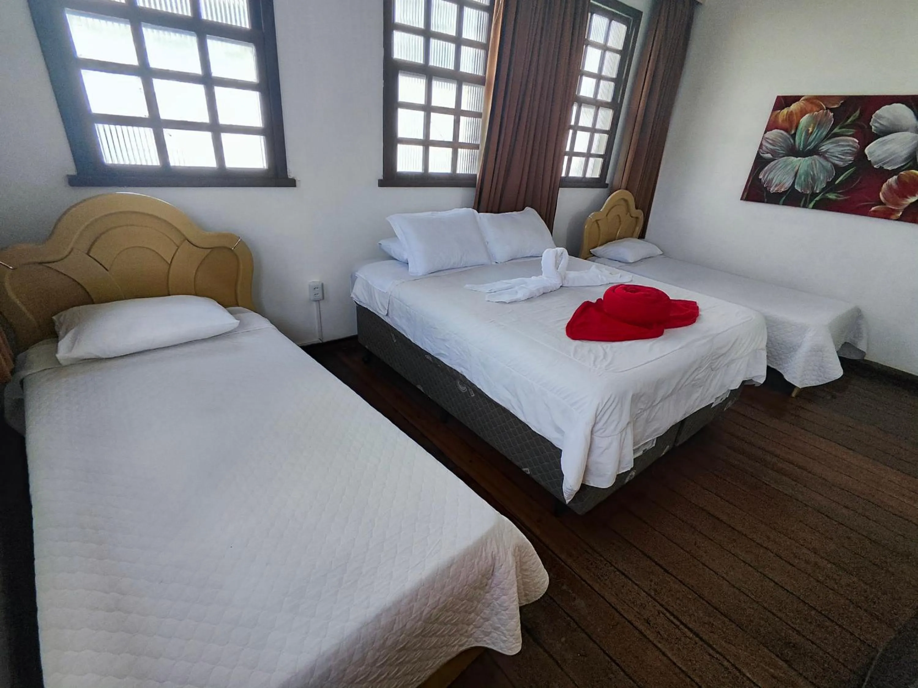 Bed in Pousada Flor de Lis