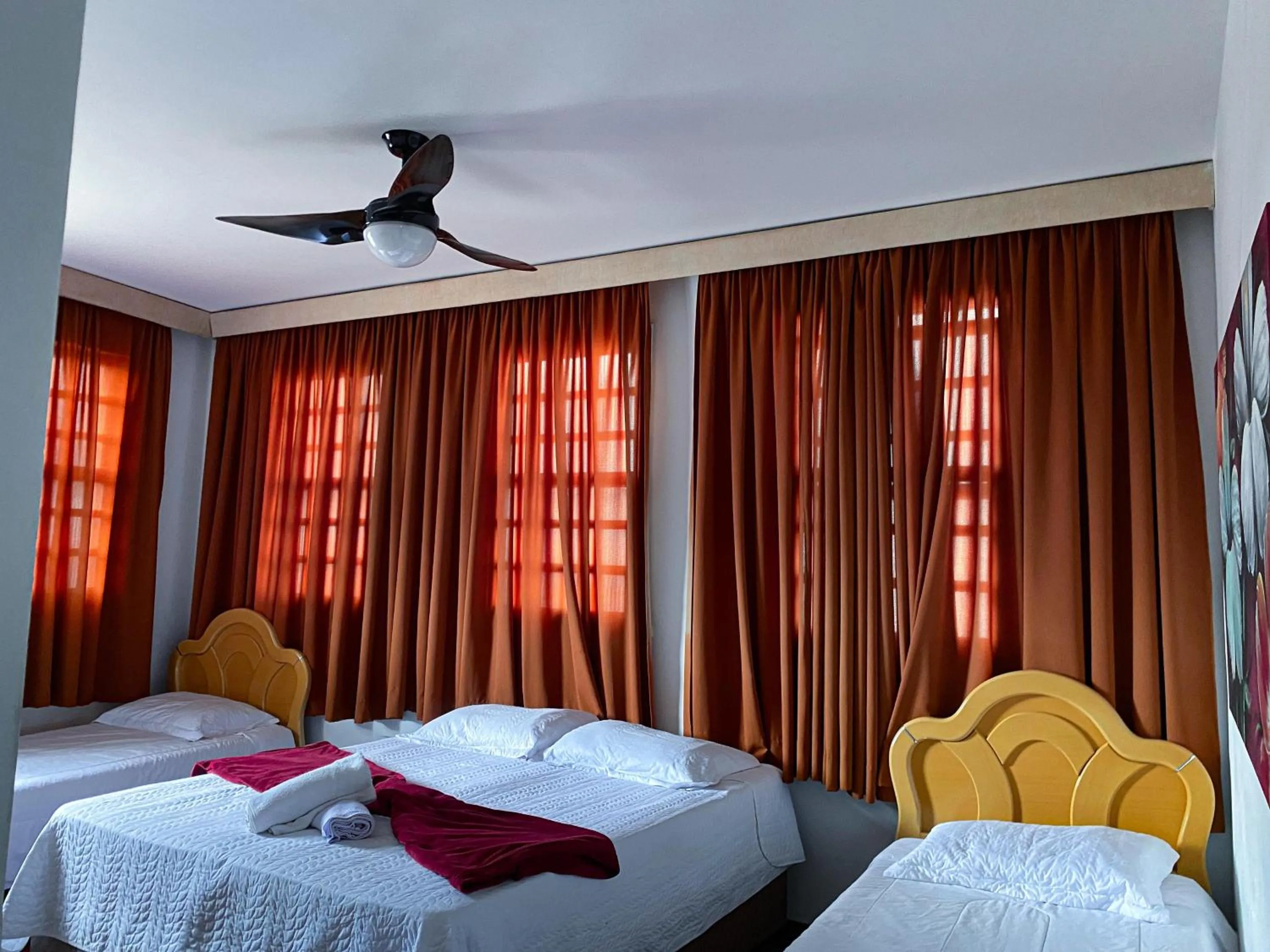 Bed in Pousada Flor de Lis