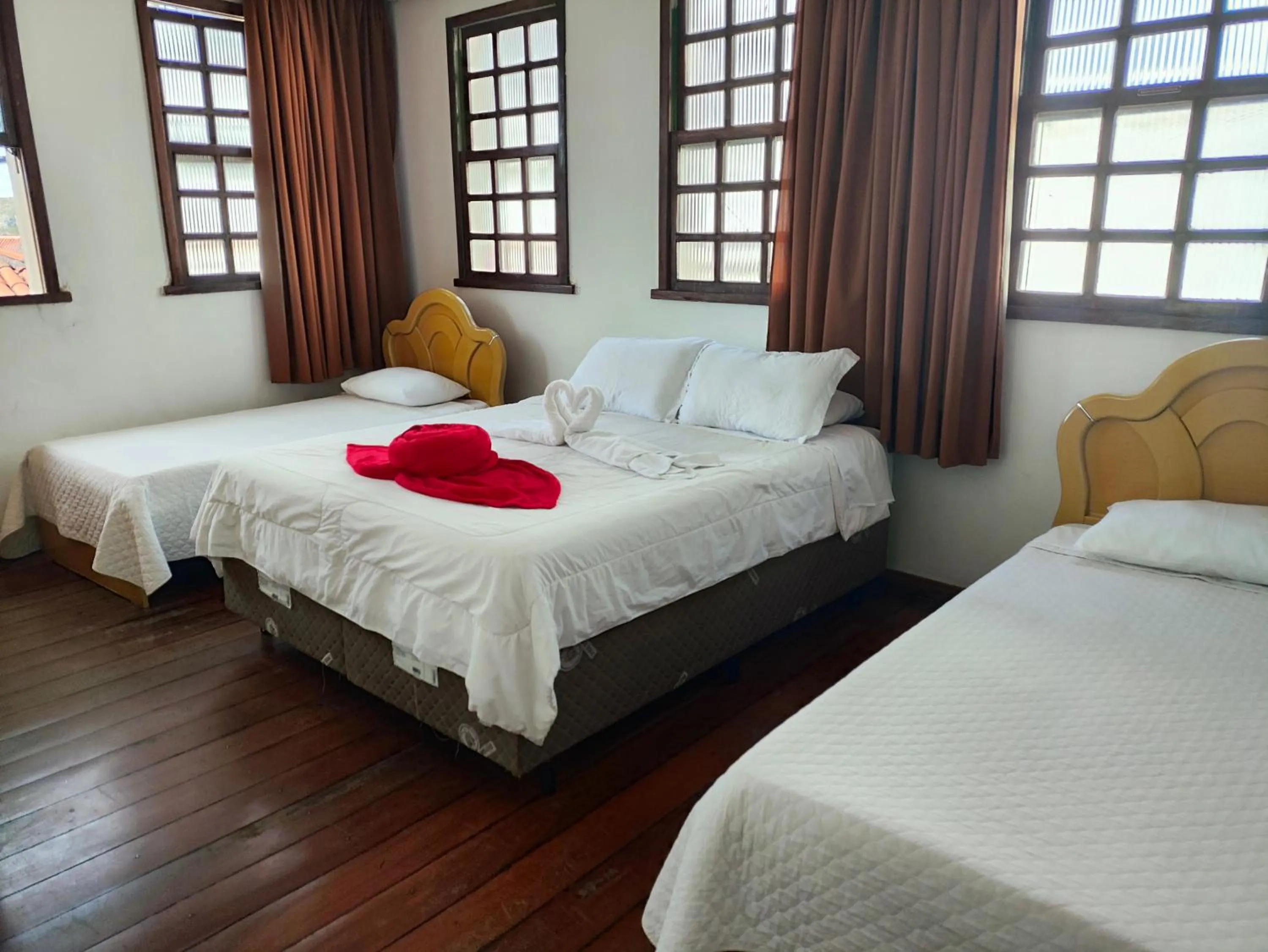 Bed in Pousada Flor de Lis