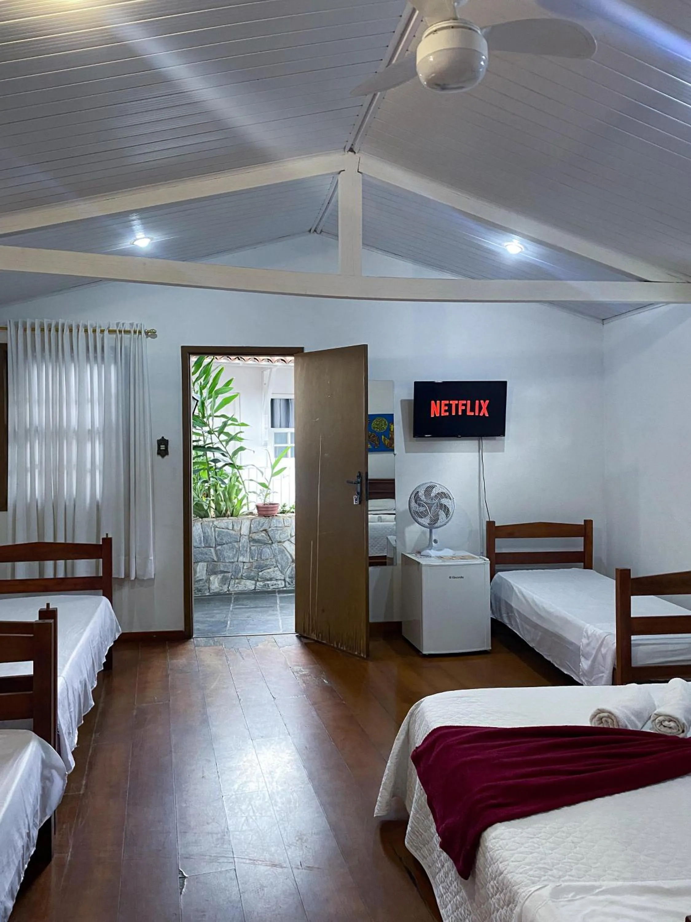 Bed in Pousada Flor de Lis