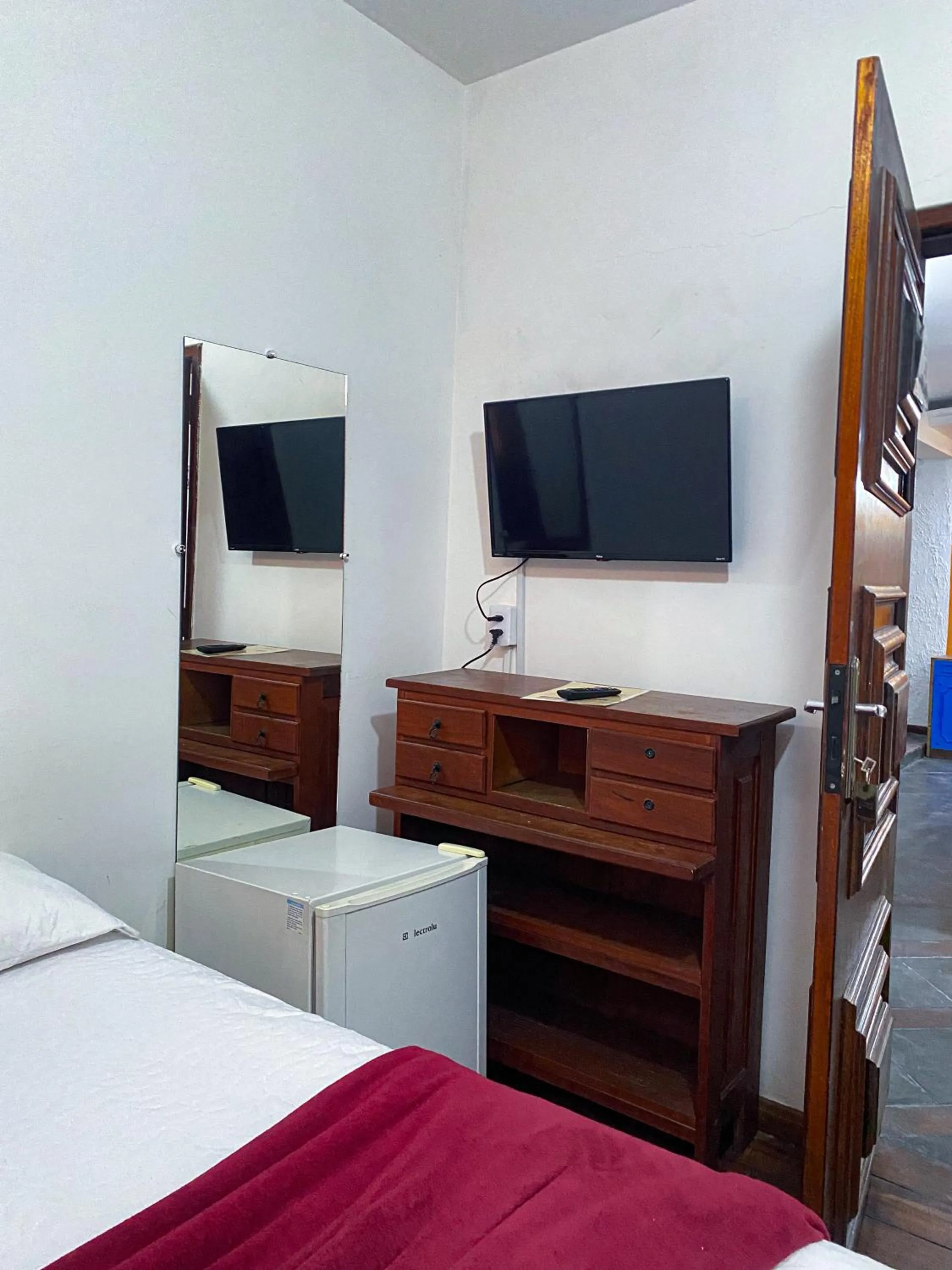 Bed in Pousada Flor de Lis