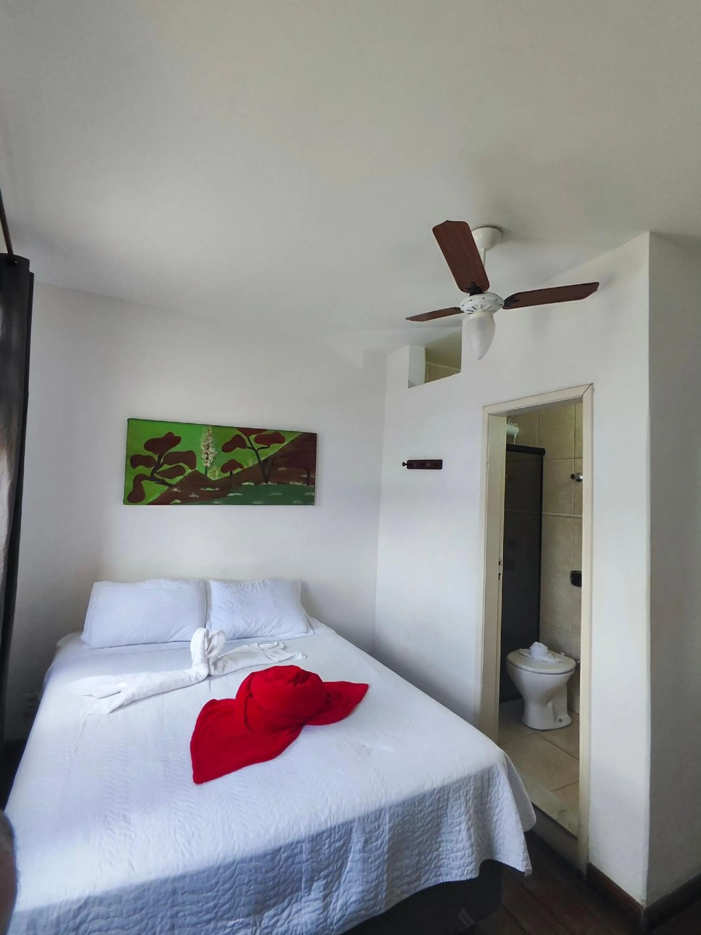 Bed in Pousada Flor de Lis