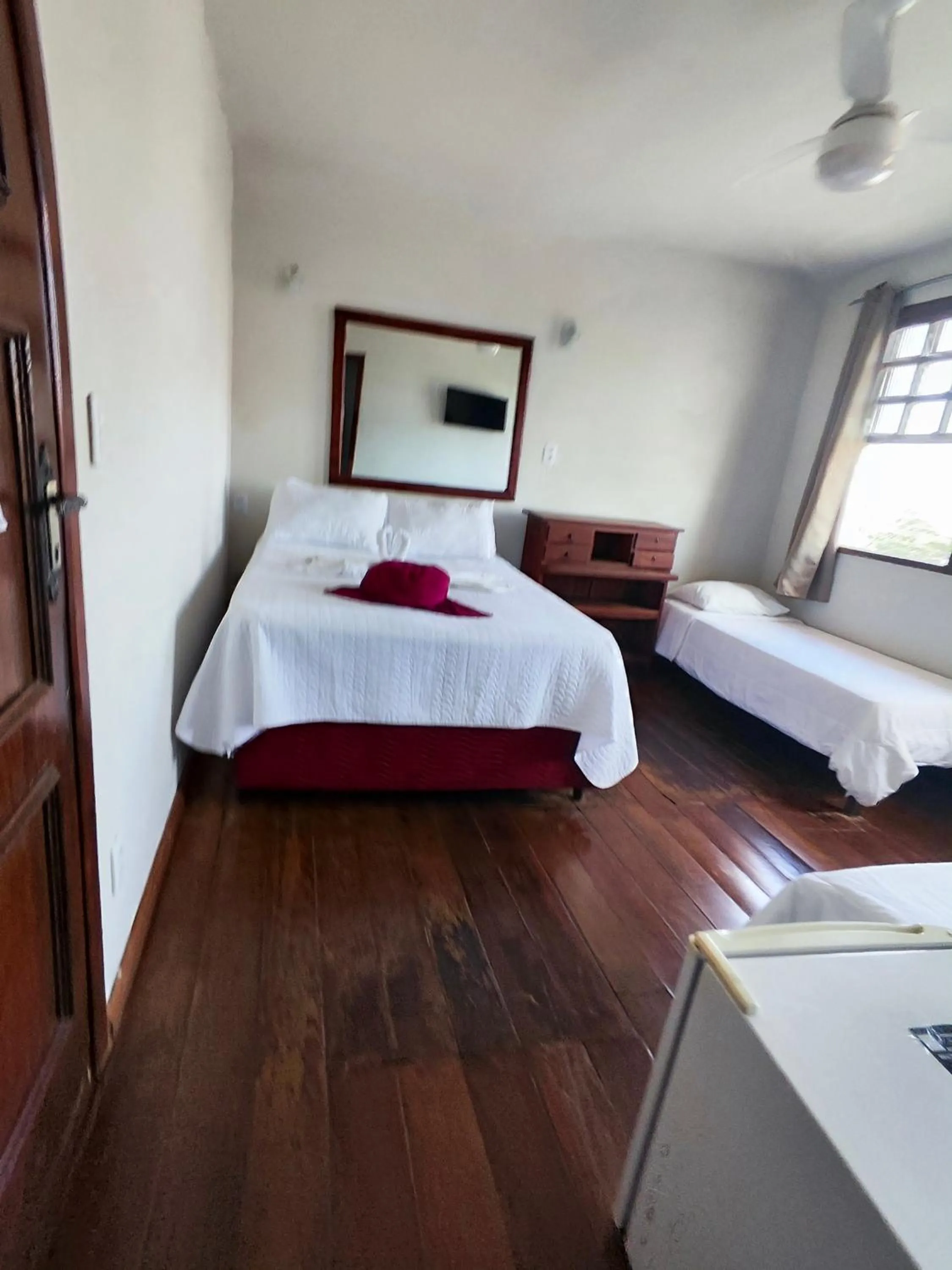 Bed in Pousada Flor de Lis