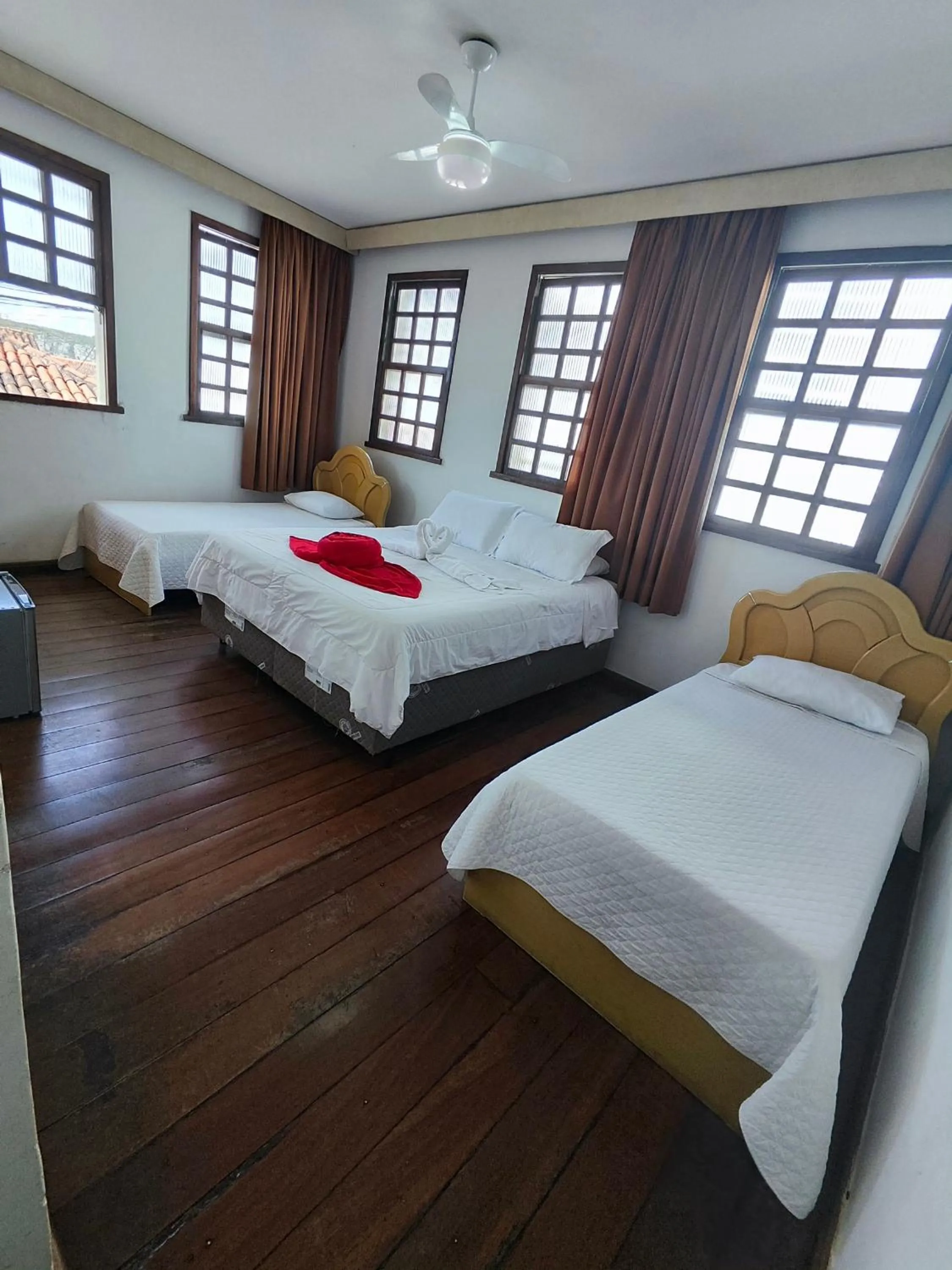 Bed in Pousada Flor de Lis