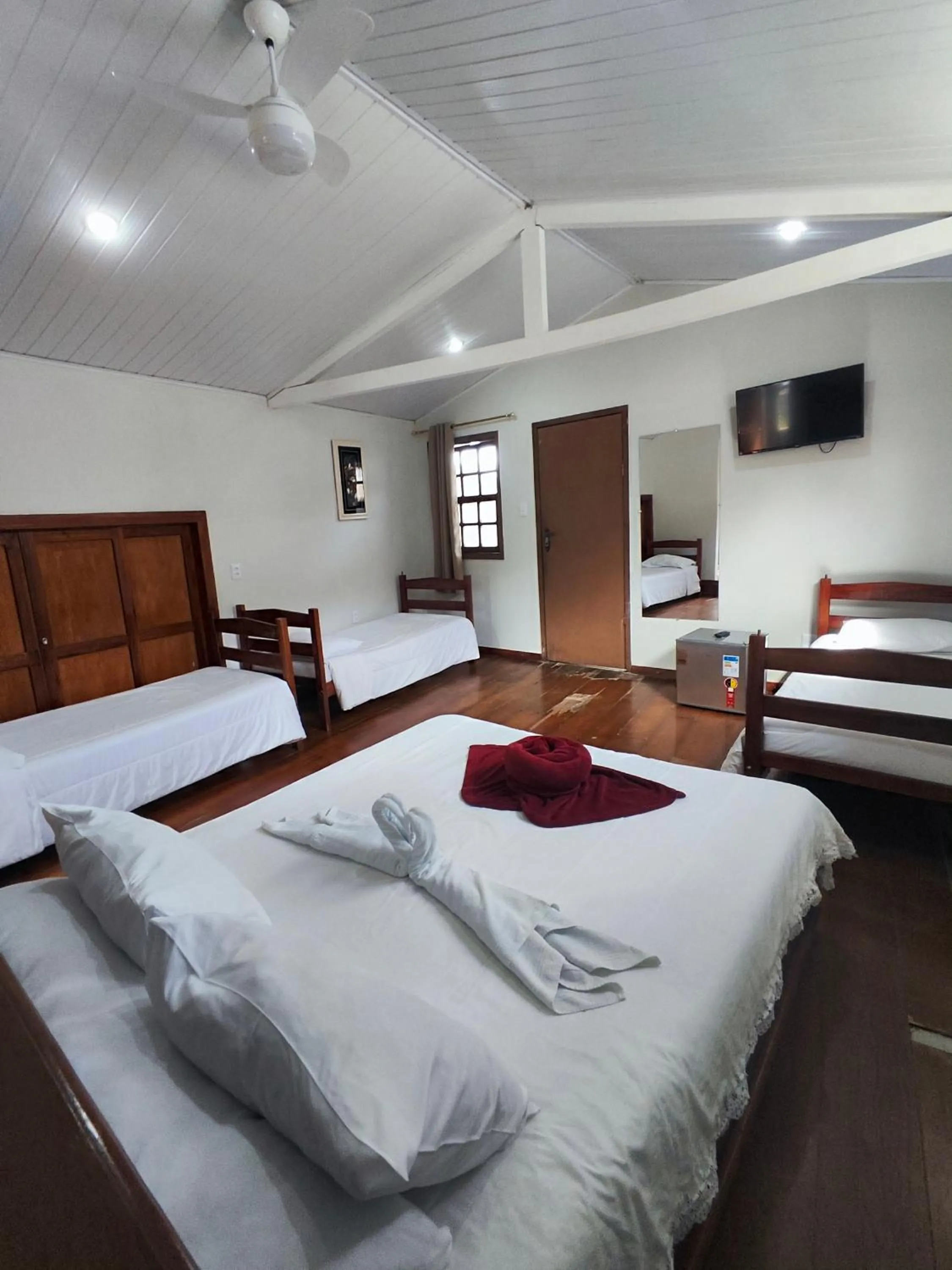 Bed in Pousada Flor de Lis