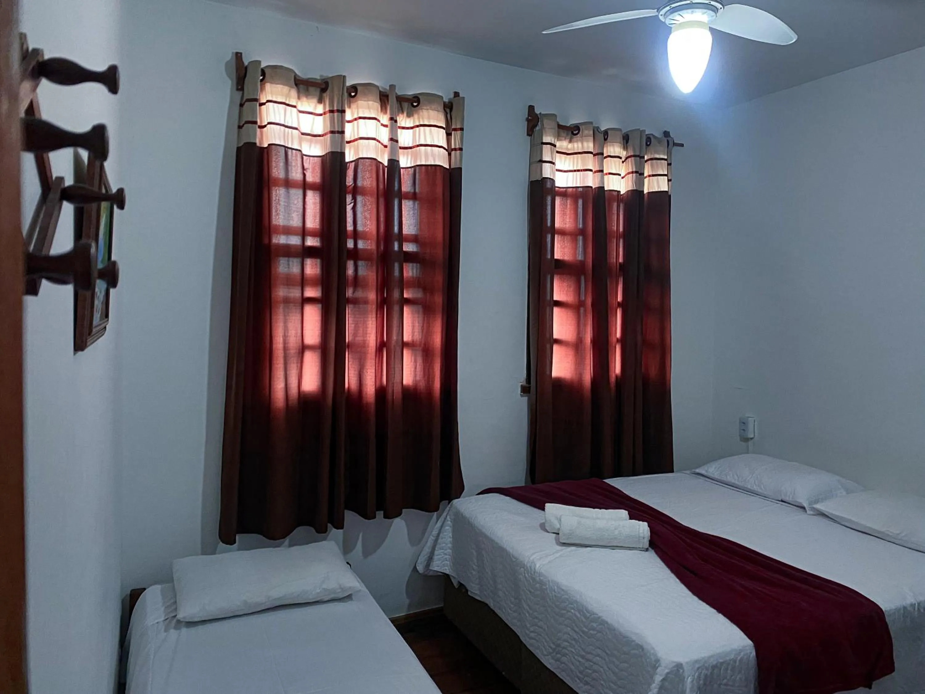 Bed in Pousada Flor de Lis