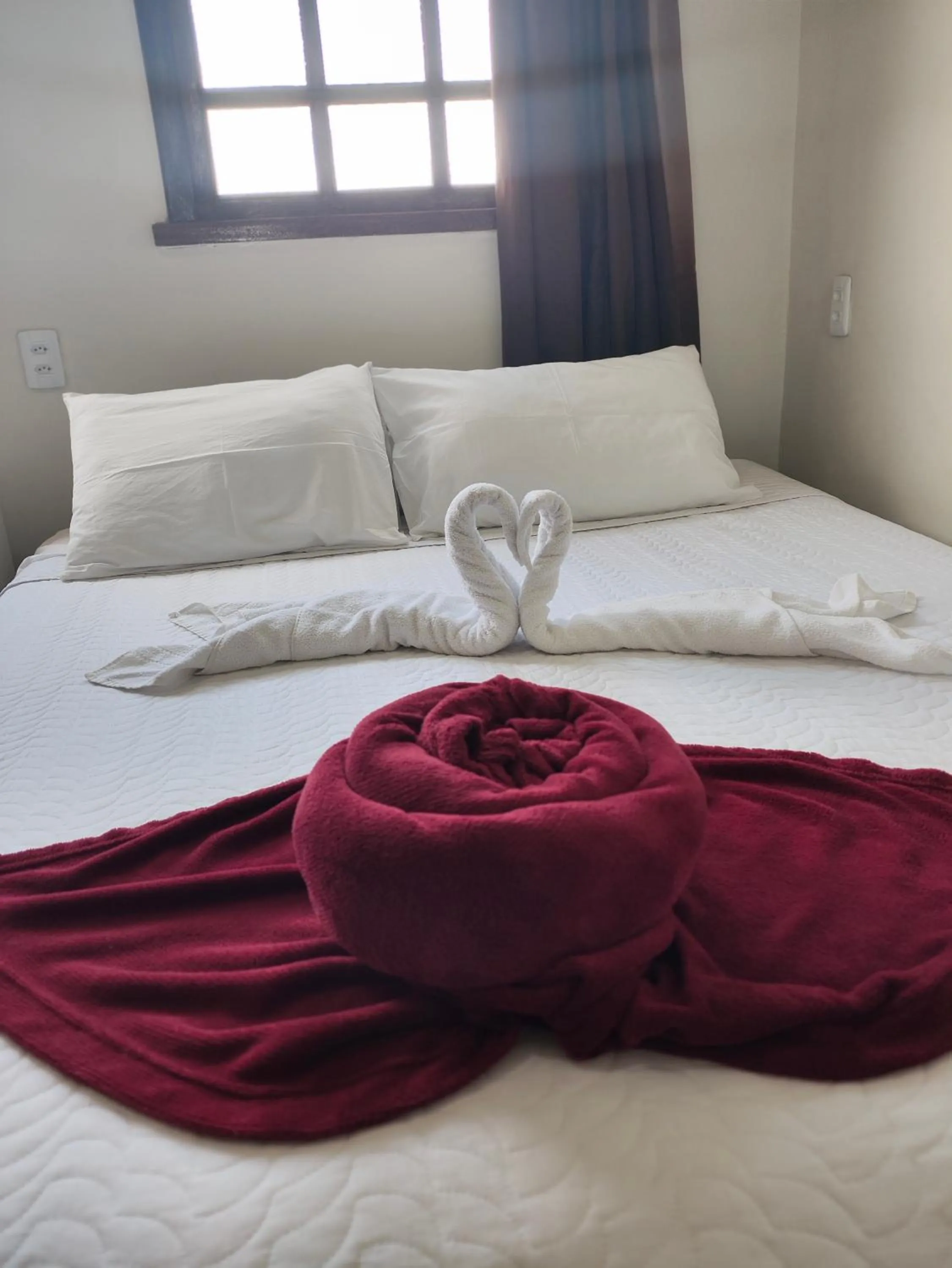 Bed in Pousada Flor de Lis