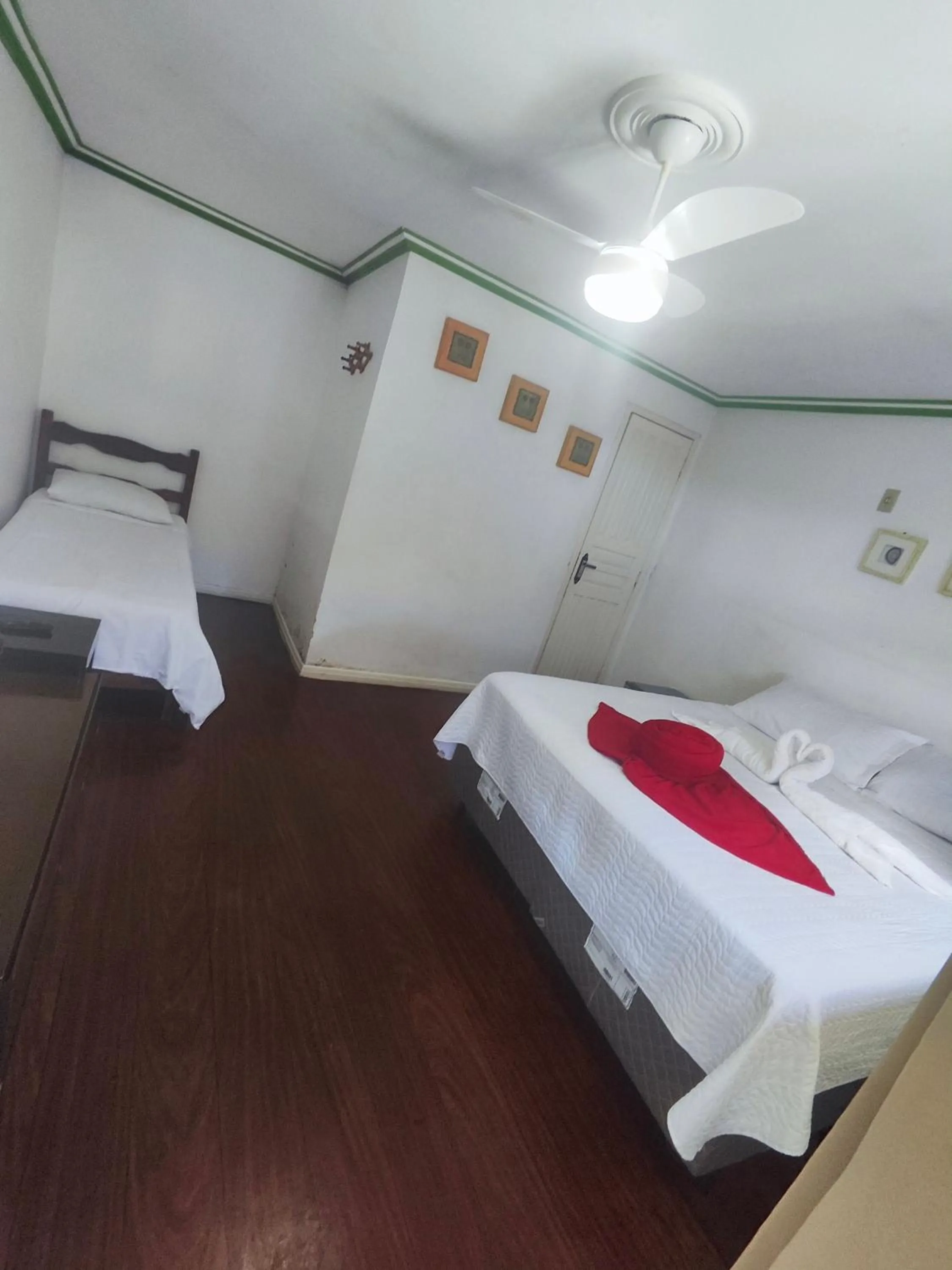 Bed in Pousada Flor de Lis