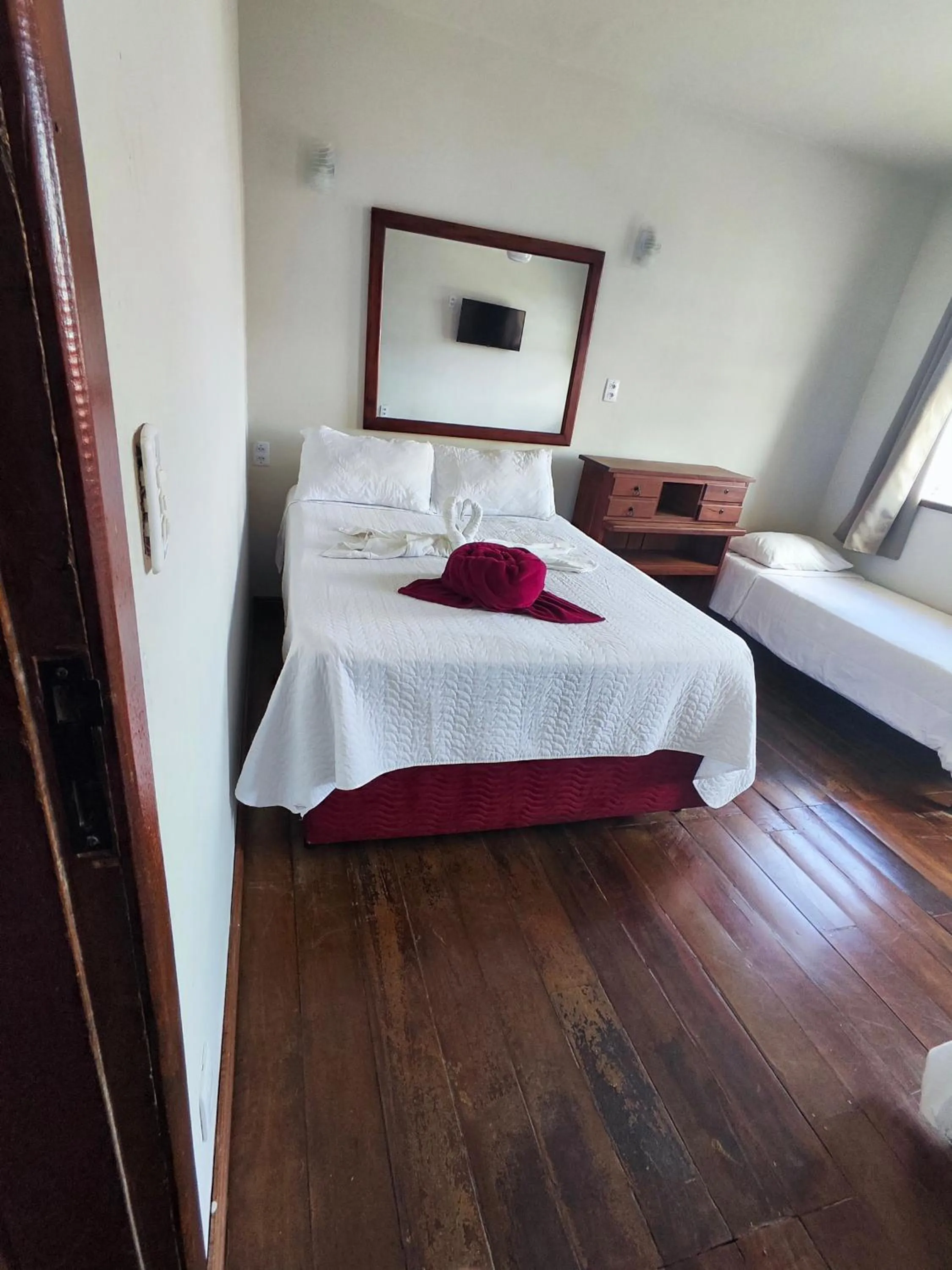 Bed in Pousada Flor de Lis