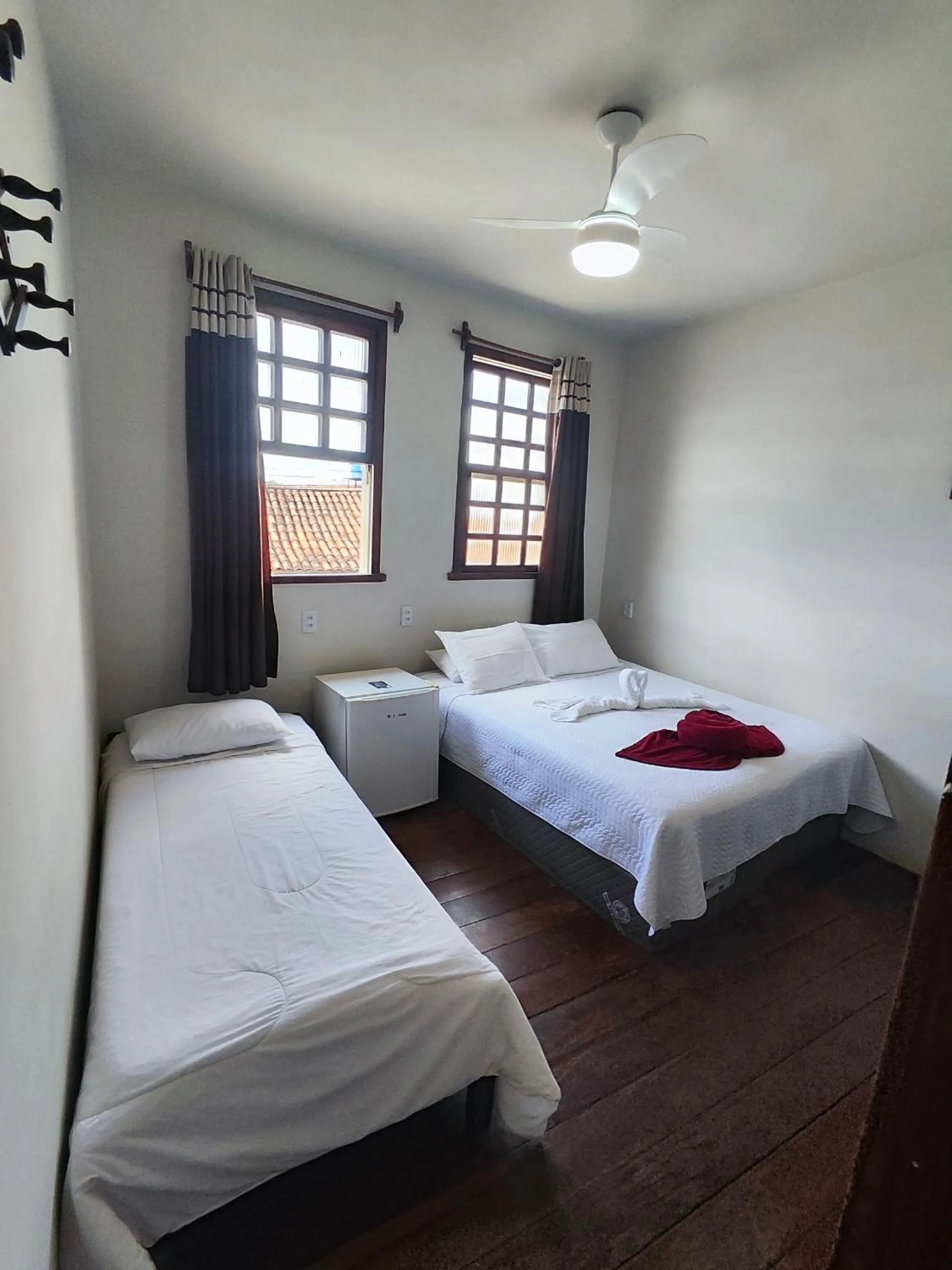 Bed in Pousada Flor de Lis