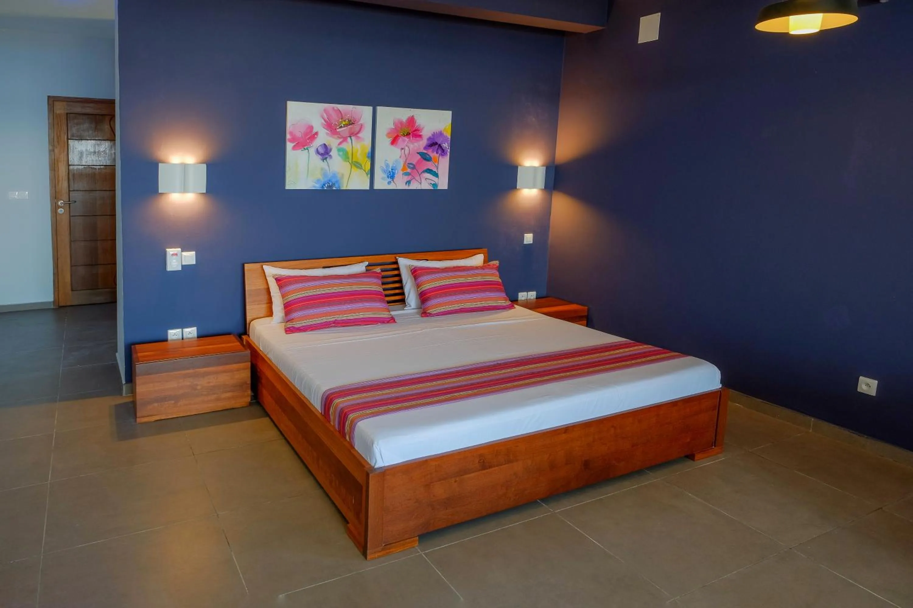 Bed in Hôtel Villa Les Orchidées