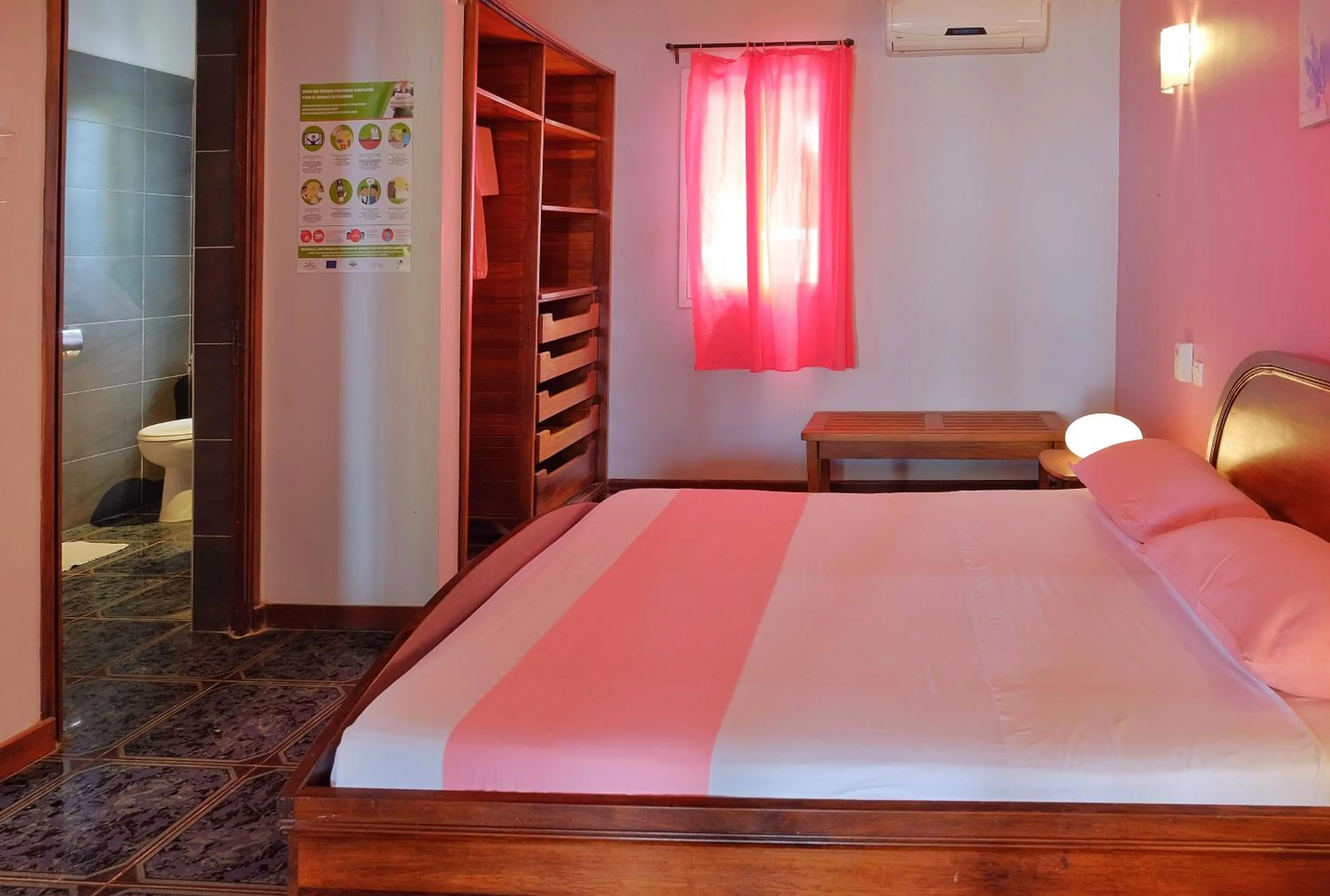 Bed in Hôtel Villa Les Orchidées