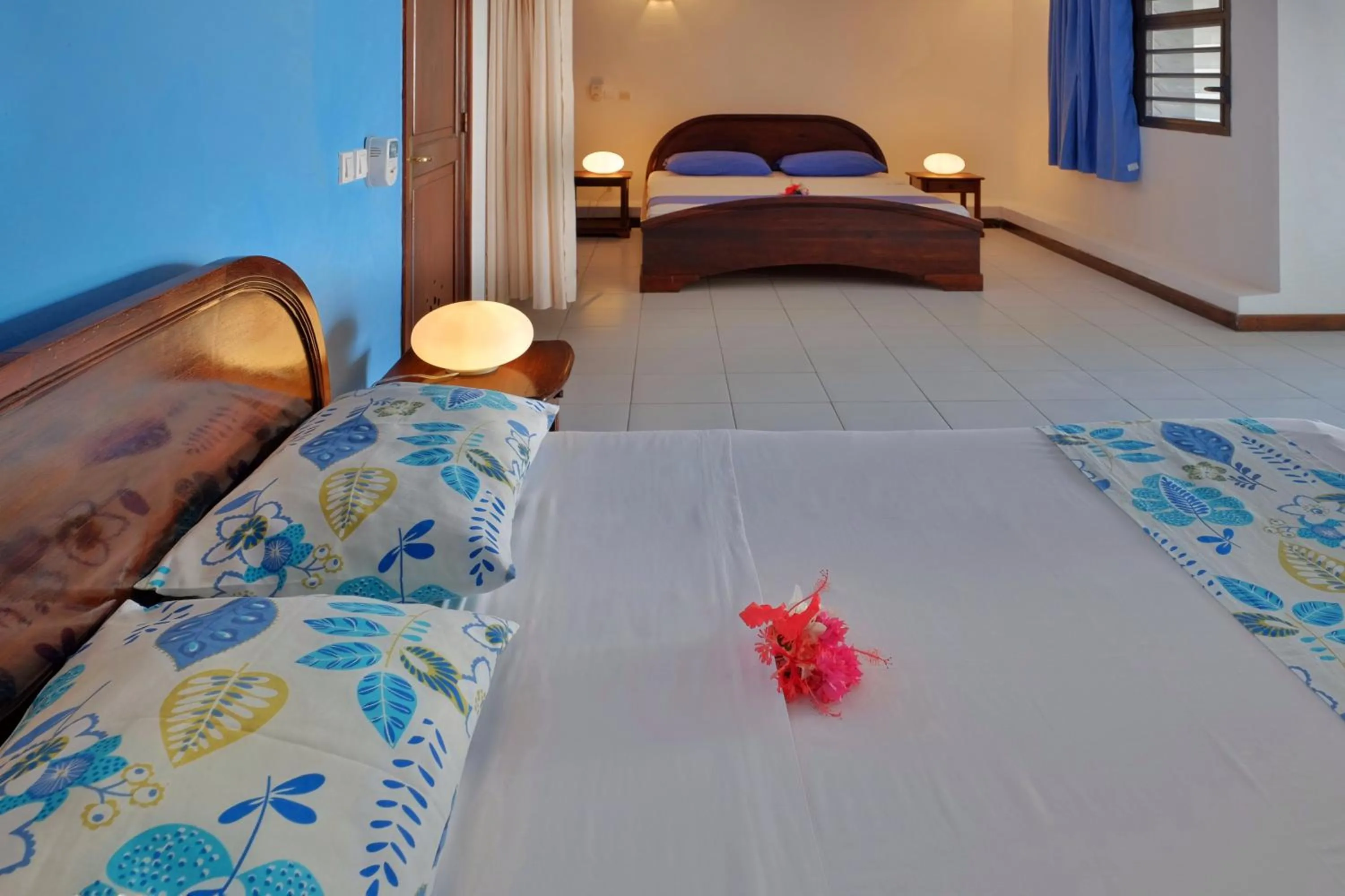 Photo of the whole room, Bed in Hôtel Villa Les Orchidées