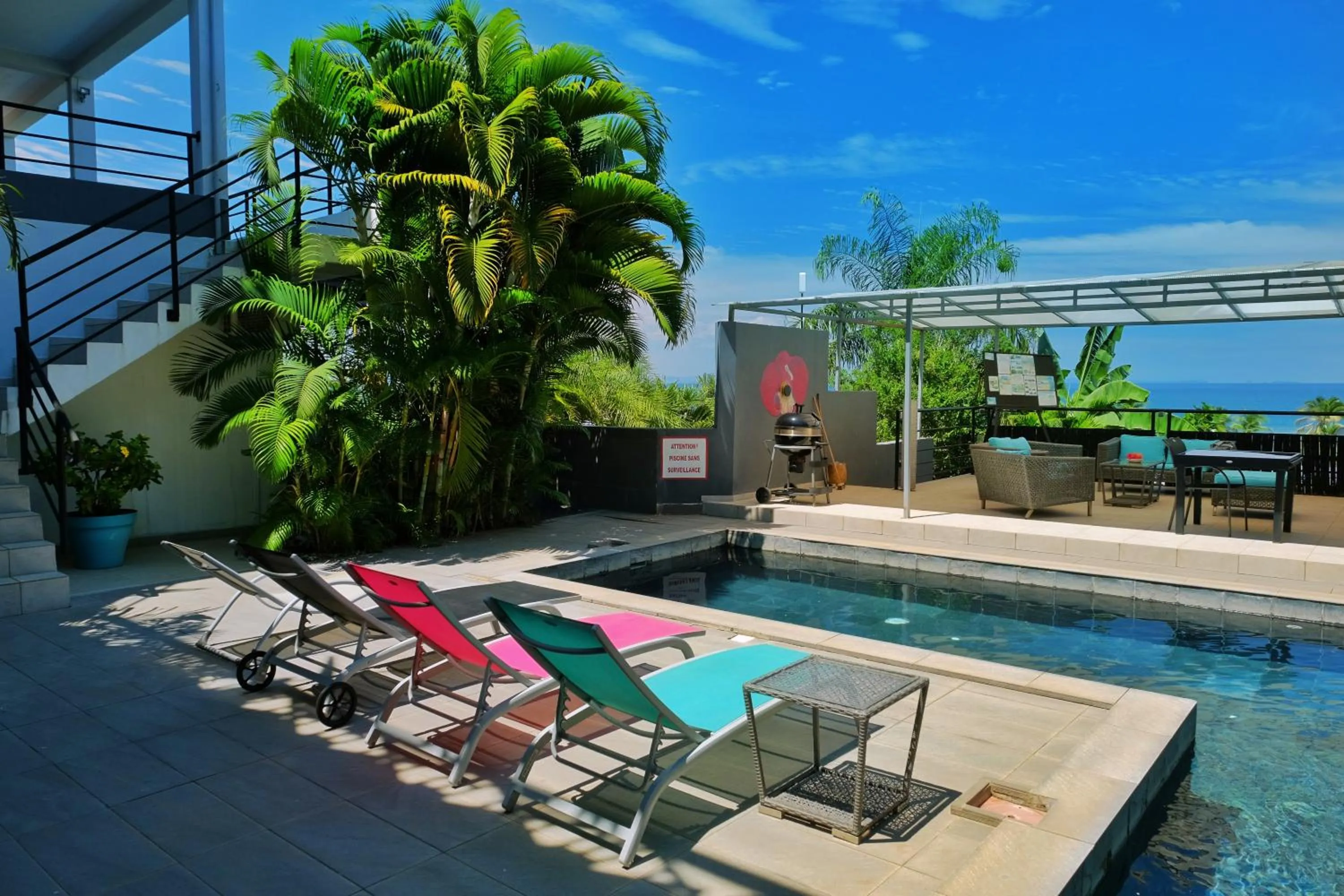 Pool view in Hôtel Villa Les Orchidées