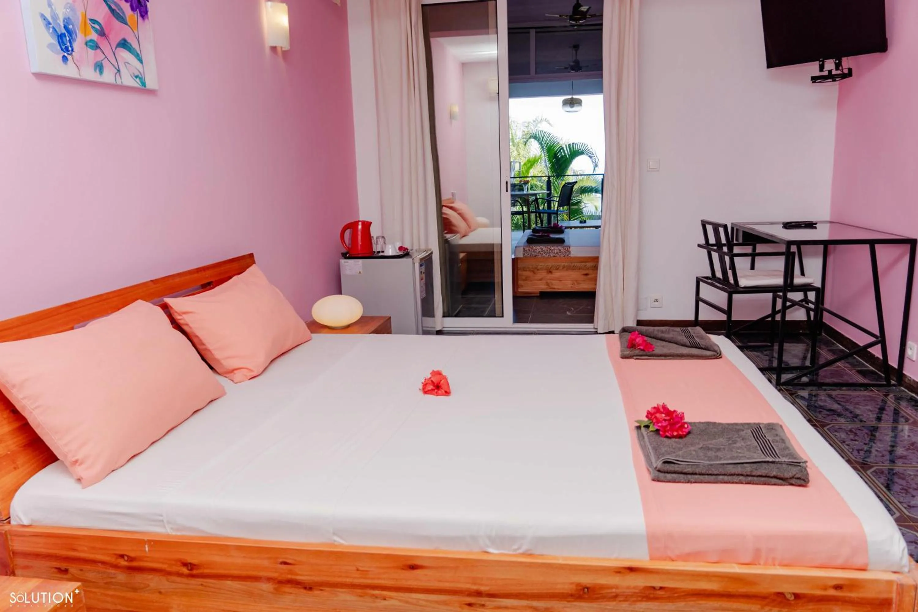 Bed in Hôtel Villa Les Orchidées