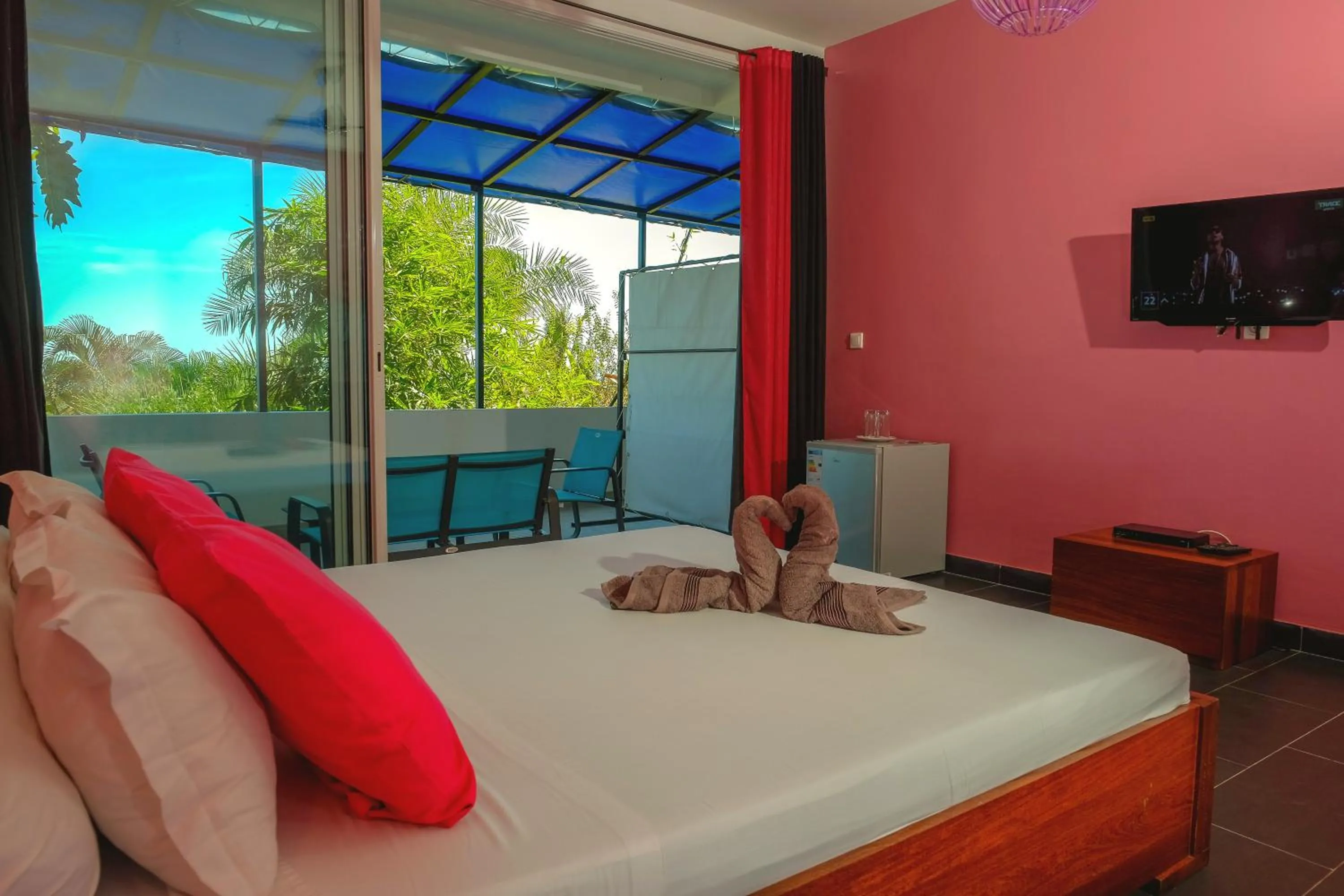 Photo of the whole room, Bed in Hôtel Villa Les Orchidées