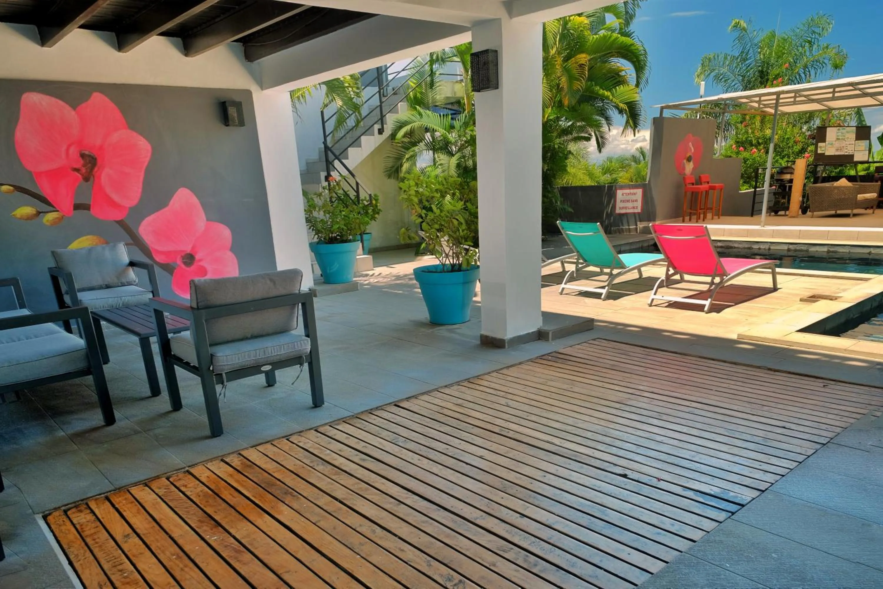 Swimming pool in Hôtel Villa Les Orchidées