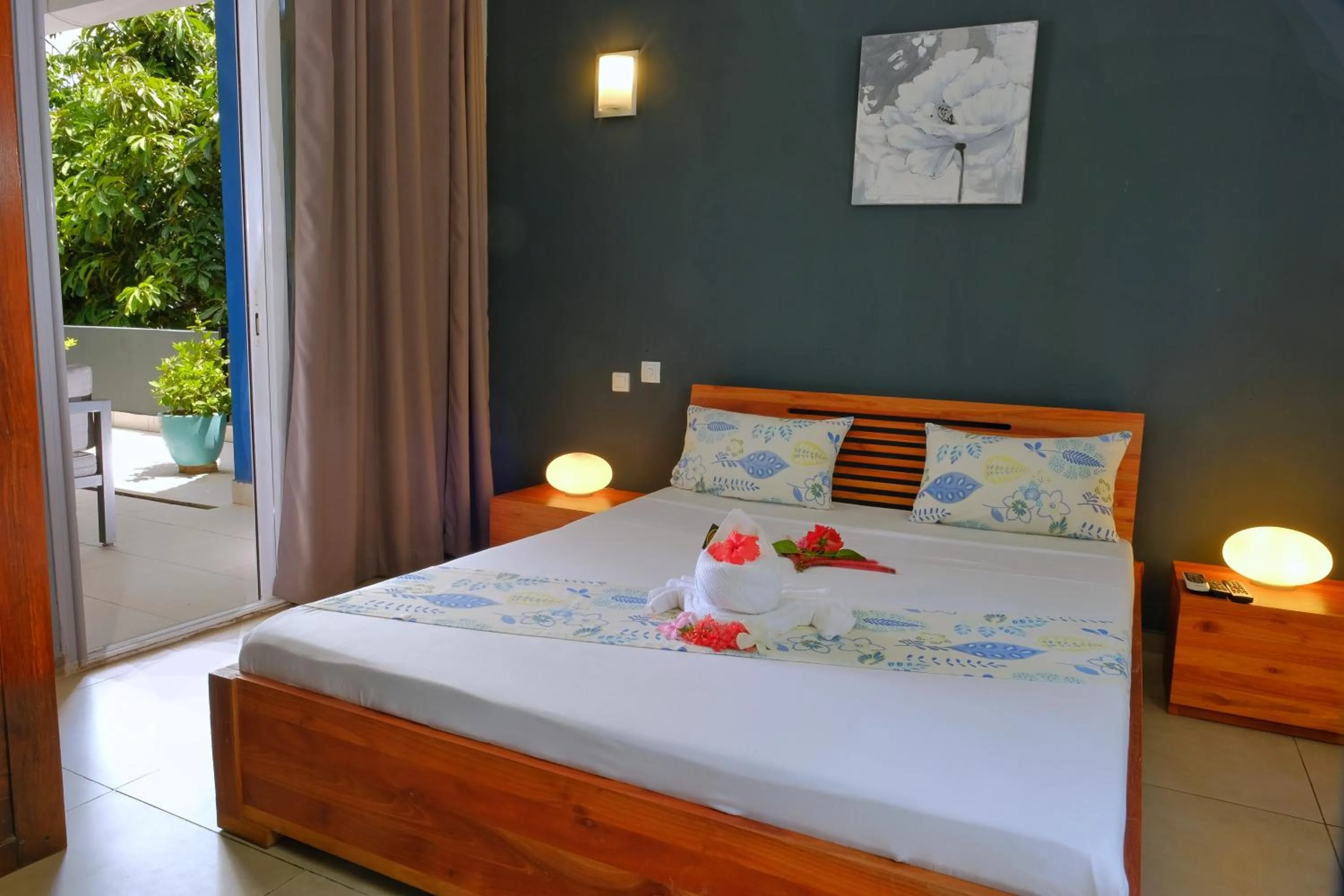 Bed in Hôtel Villa Les Orchidées