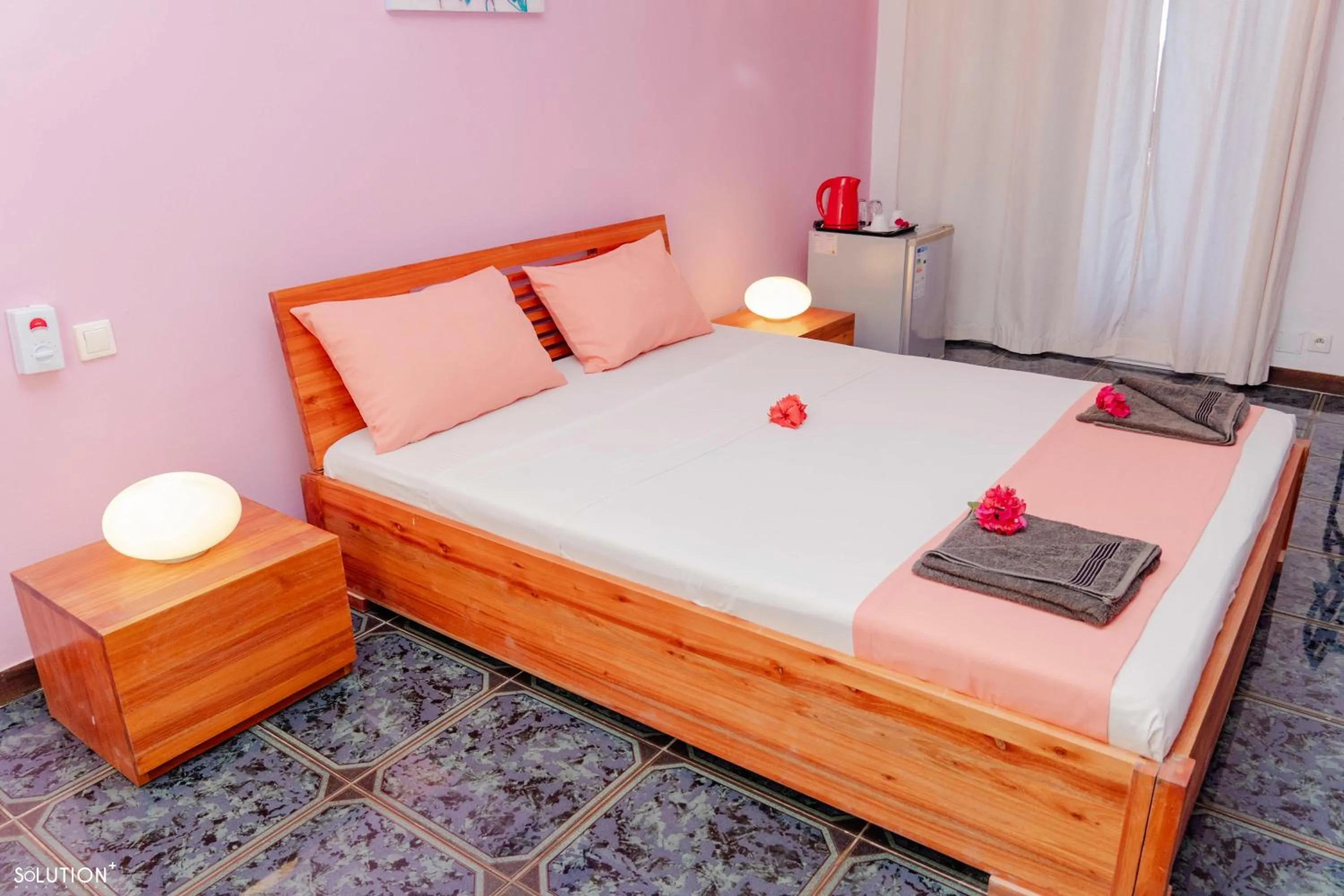 Bed in Hôtel Villa Les Orchidées