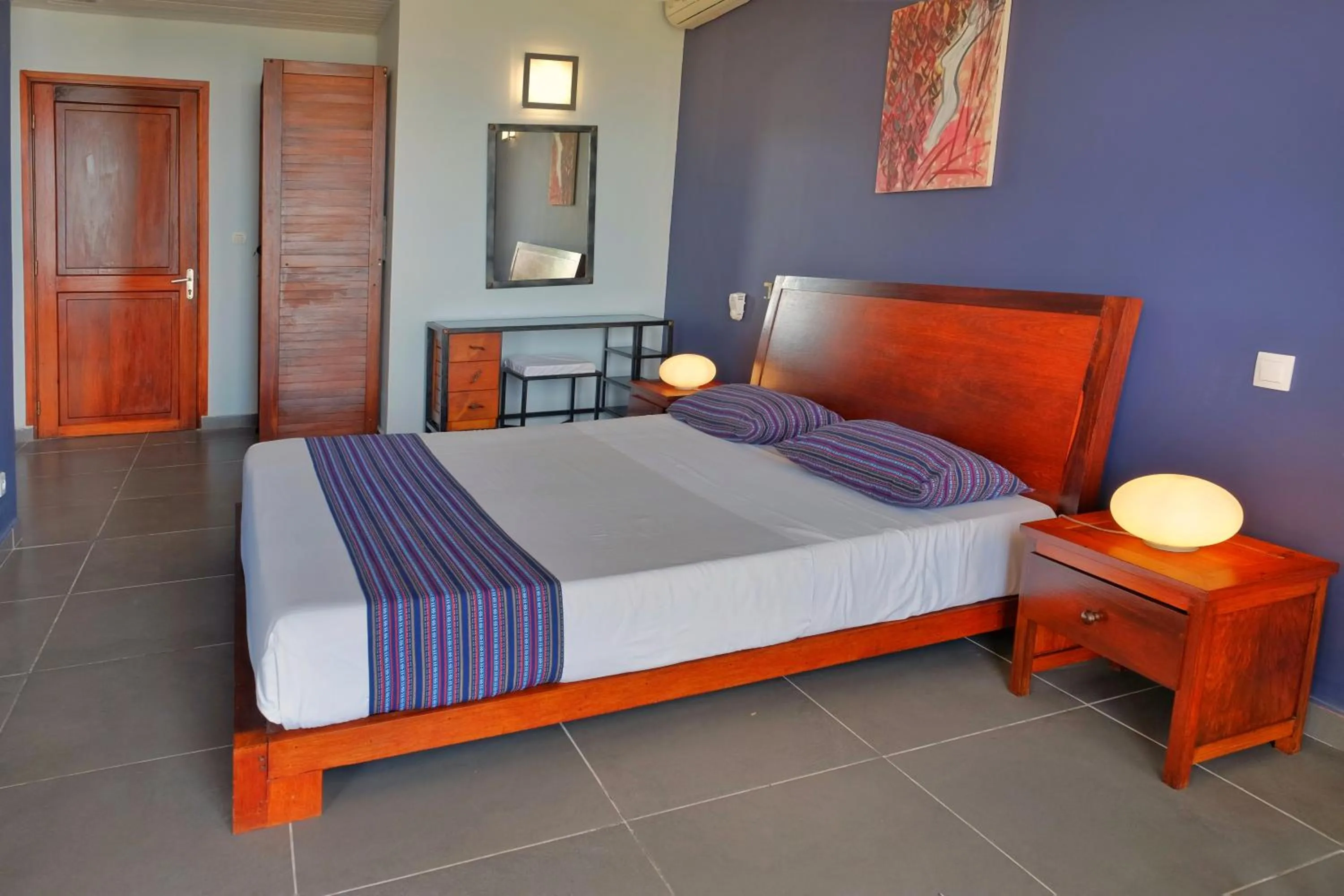 Bed in Hôtel Villa Les Orchidées