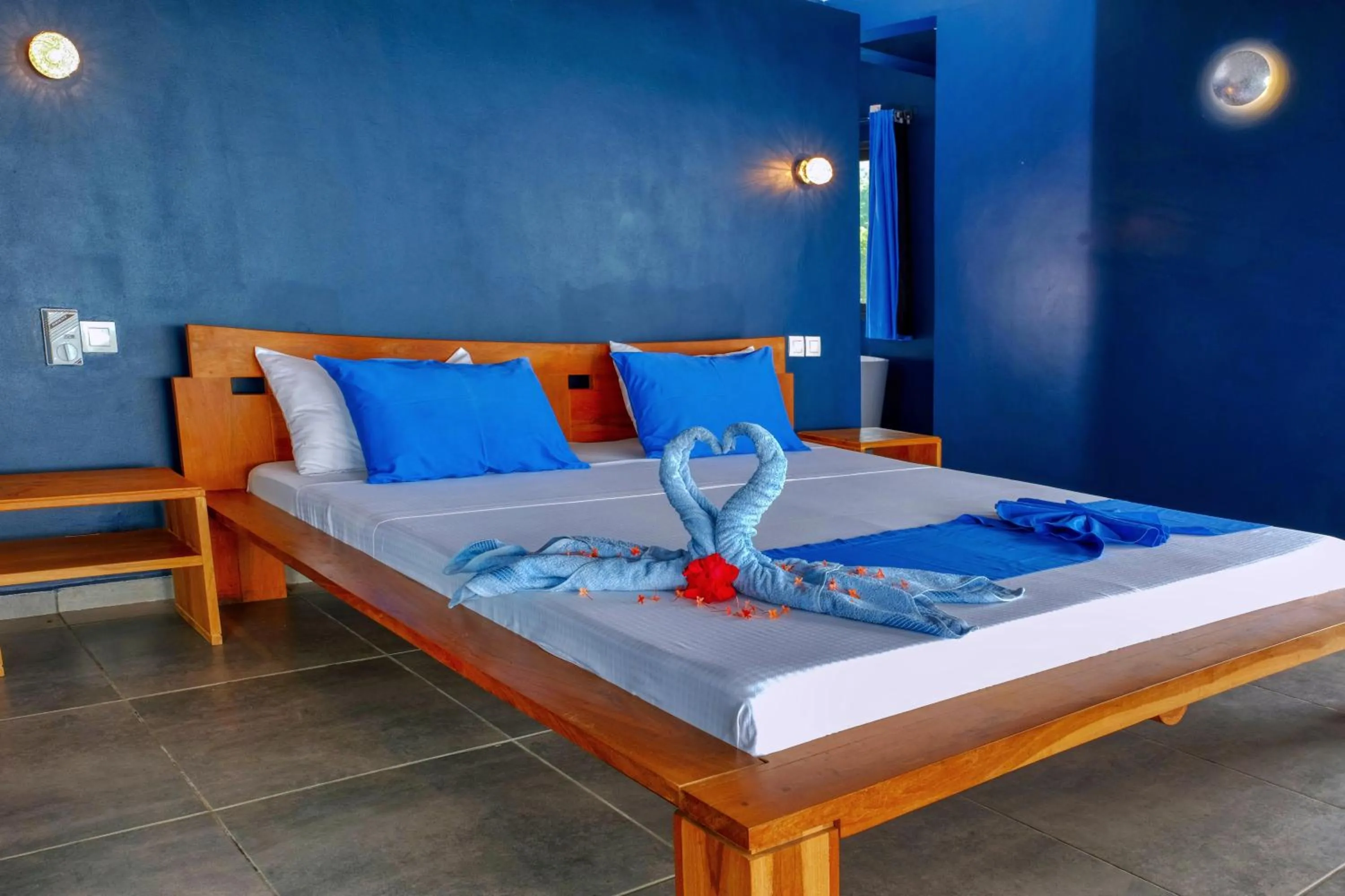 Bed in Hôtel Villa Les Orchidées