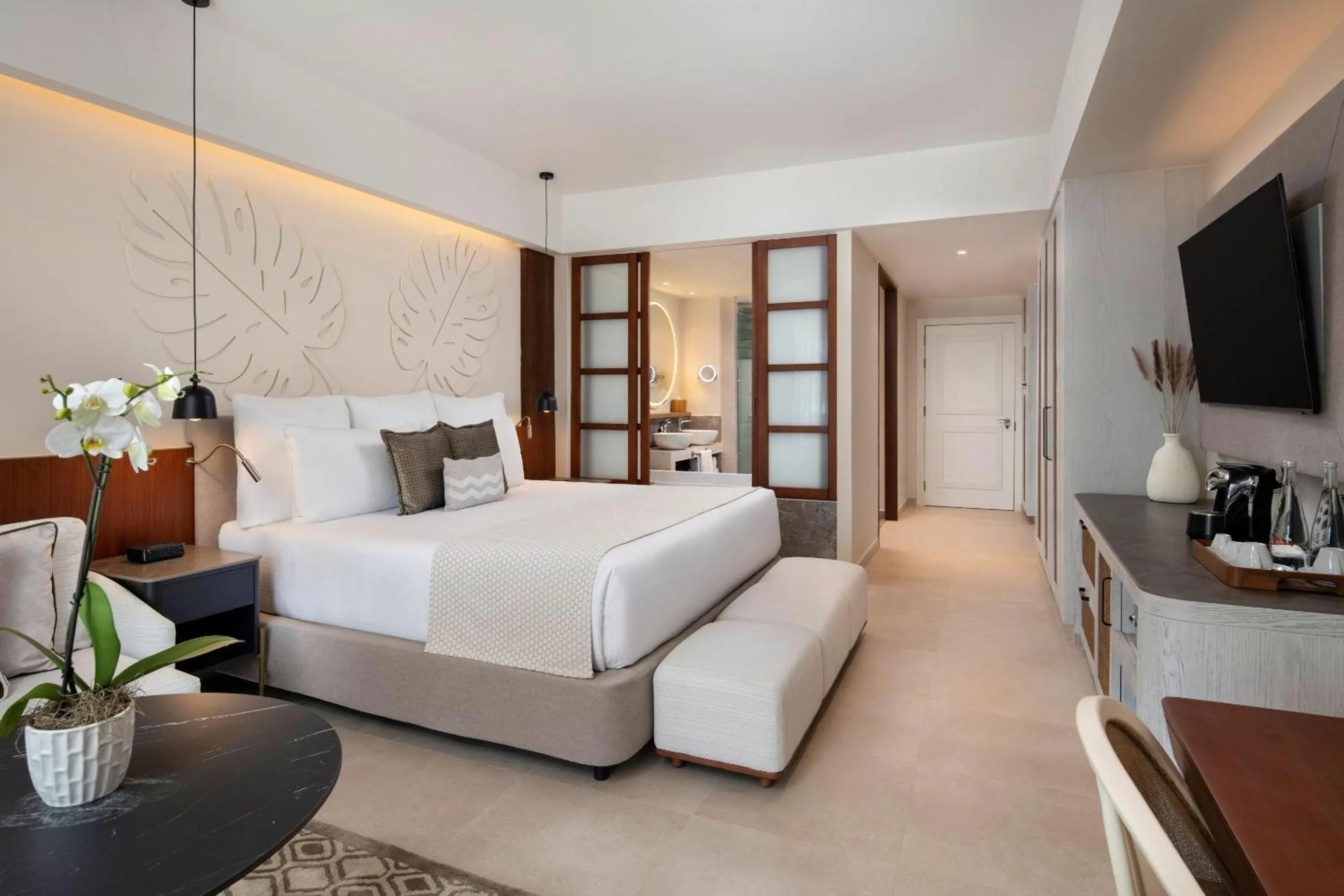 Bed in Secrets Playa Esmeralda Resort & Spa - All Inclusive