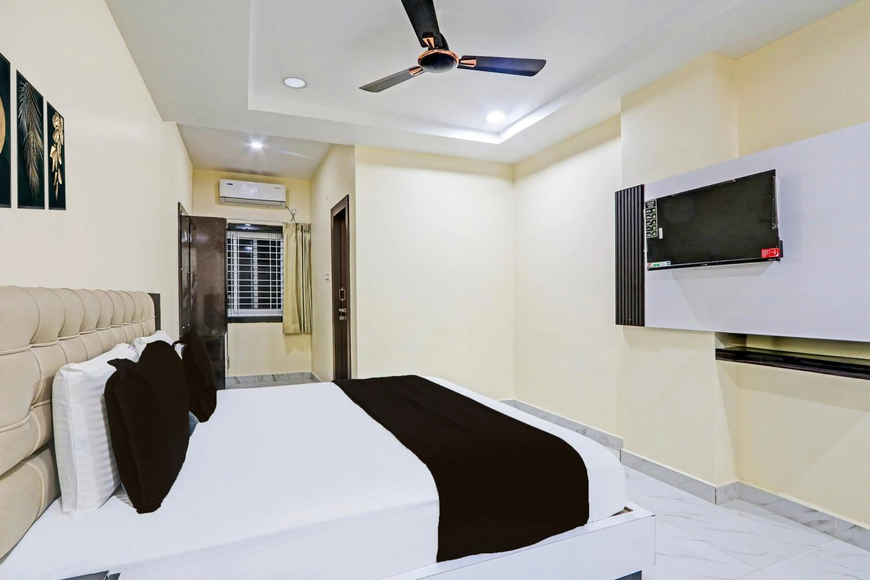 Bedroom in Super Hotel O SRI VISHNU RESIDENCY