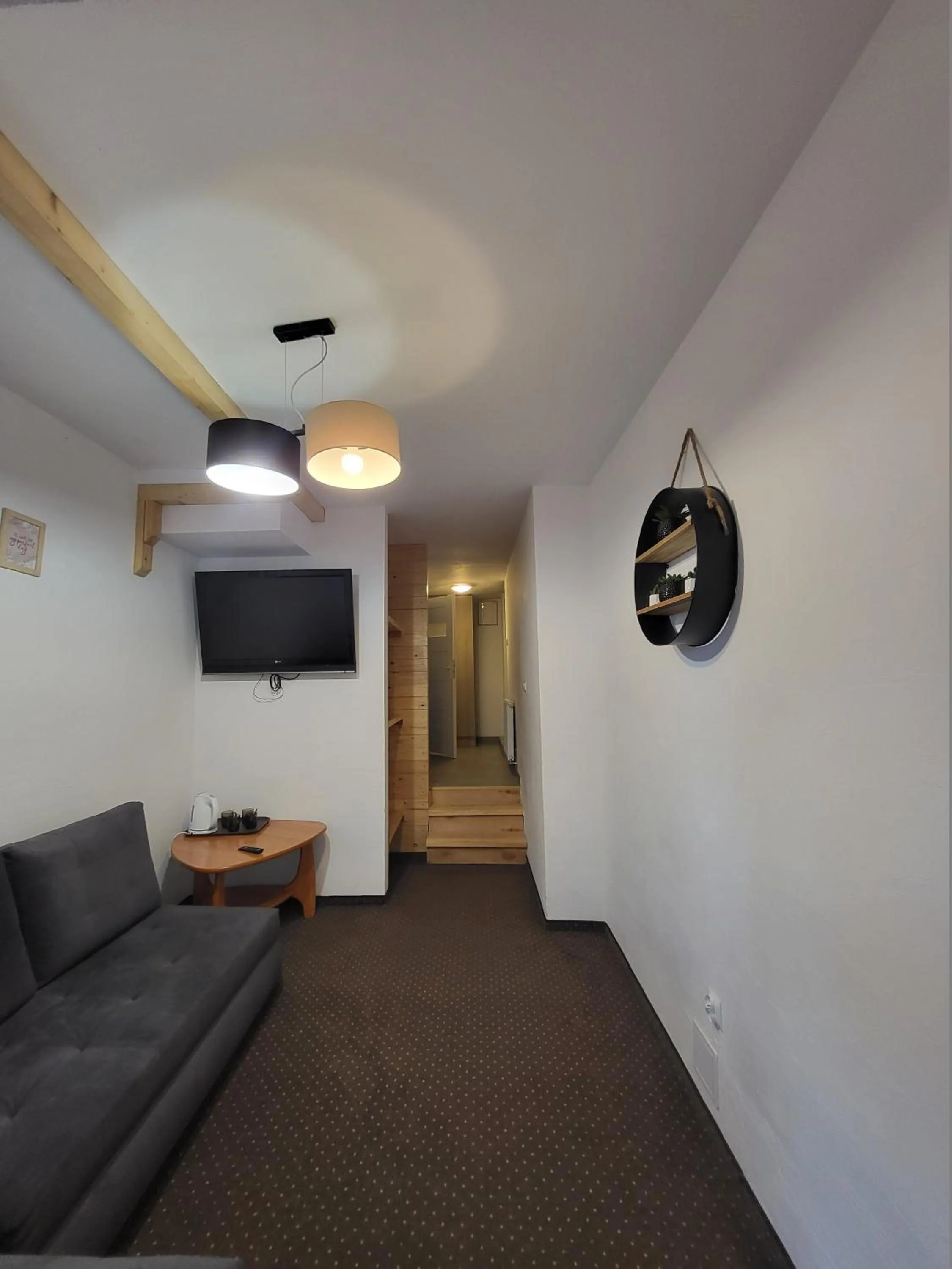 Communal lounge/ TV room in Dom Wczasowo Rekreacyjny Zgoda