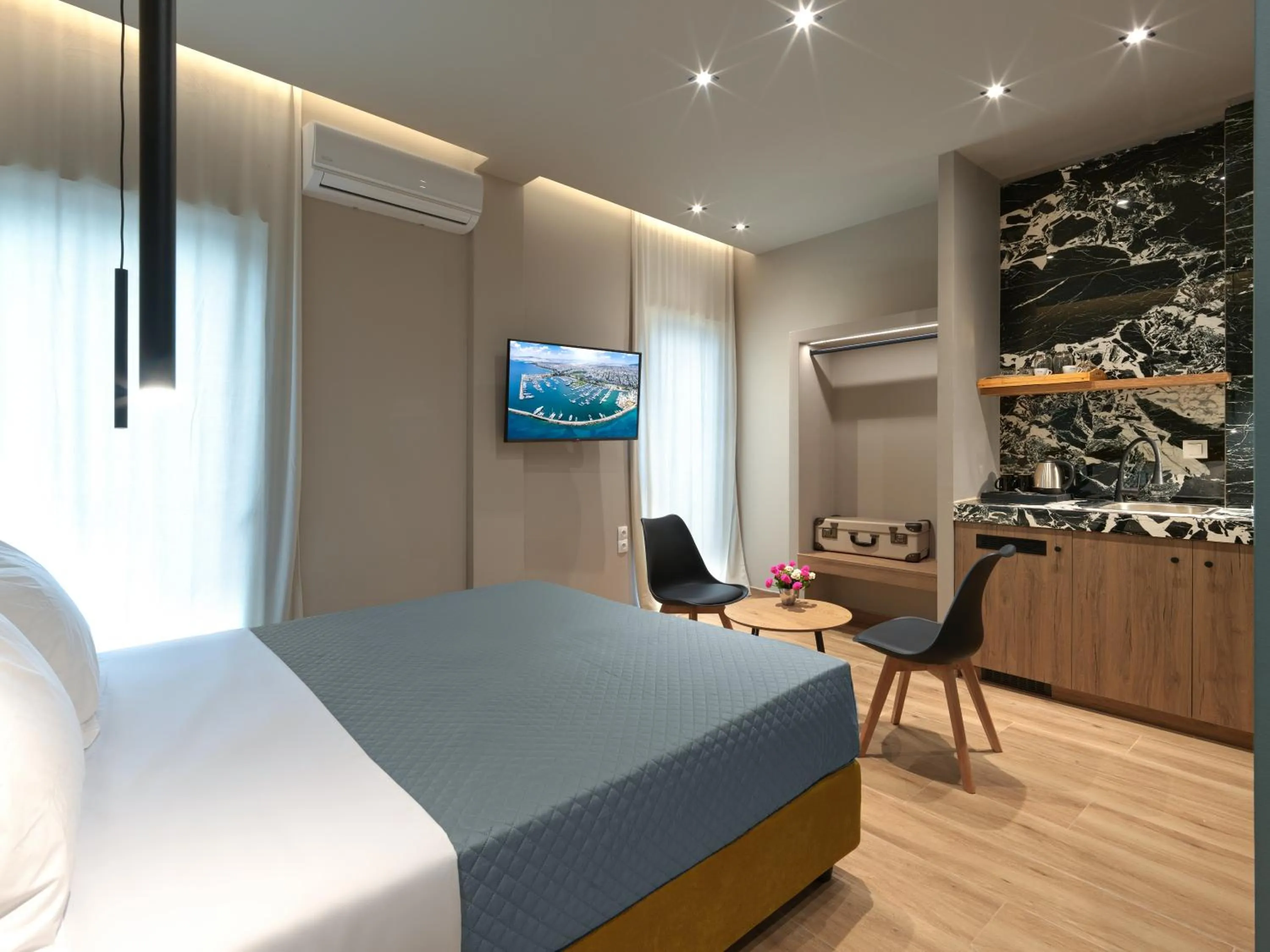 Photo of the whole room, Bed in YaPe Coastal Suites at Alimos Beach