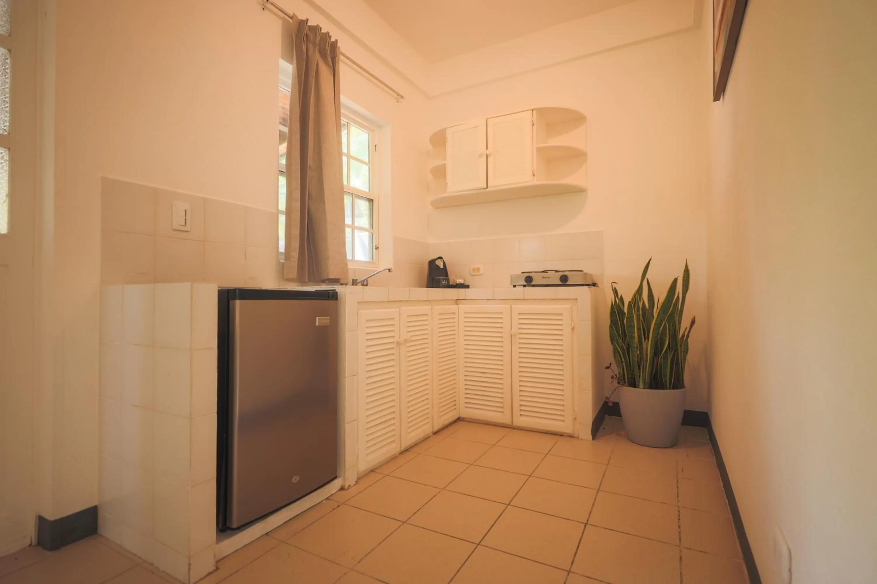 Kitchen or kitchenette in Alma Vida Hotel