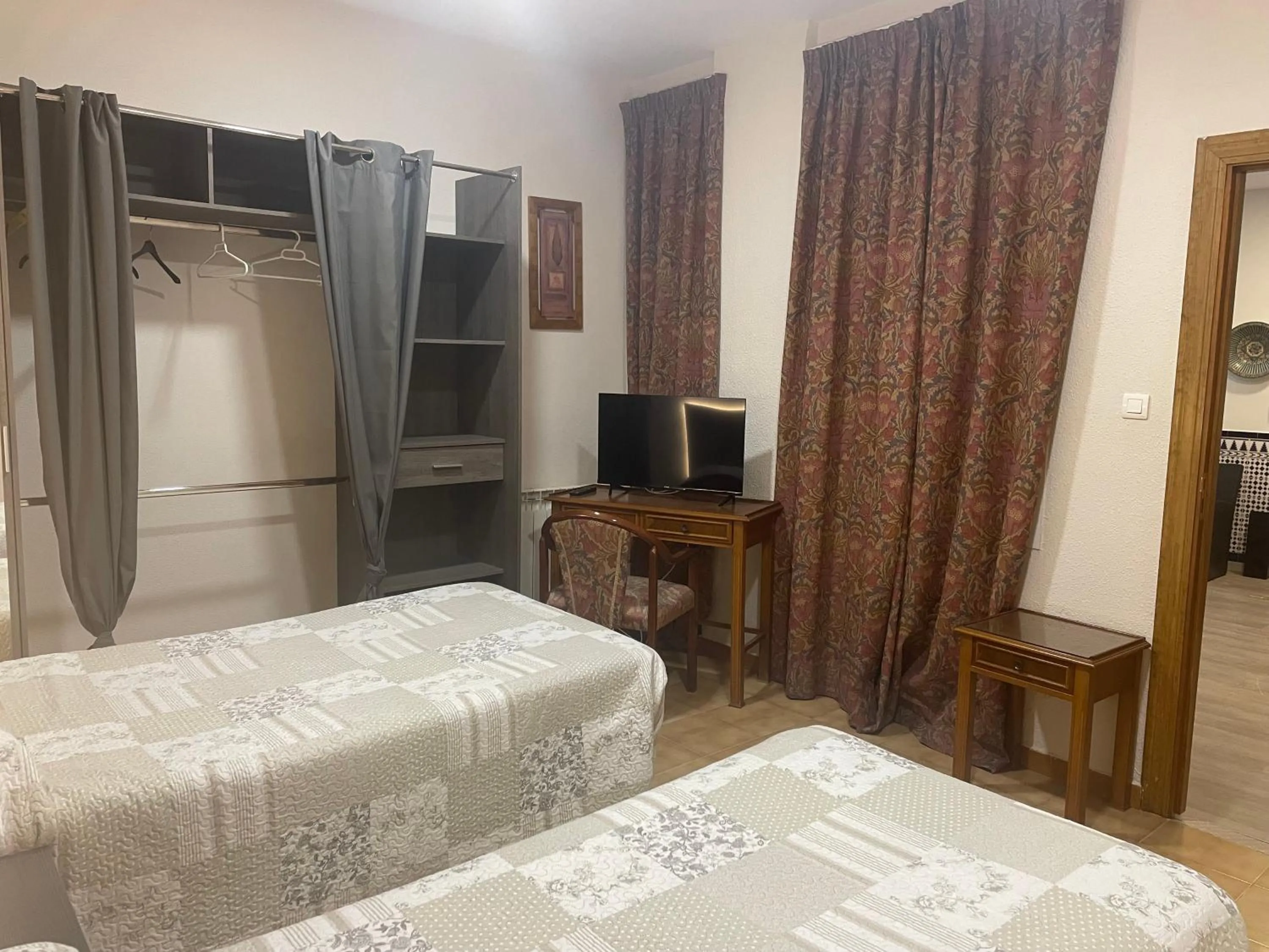 Photo of the whole room, Bed in Hostal Costa Azul