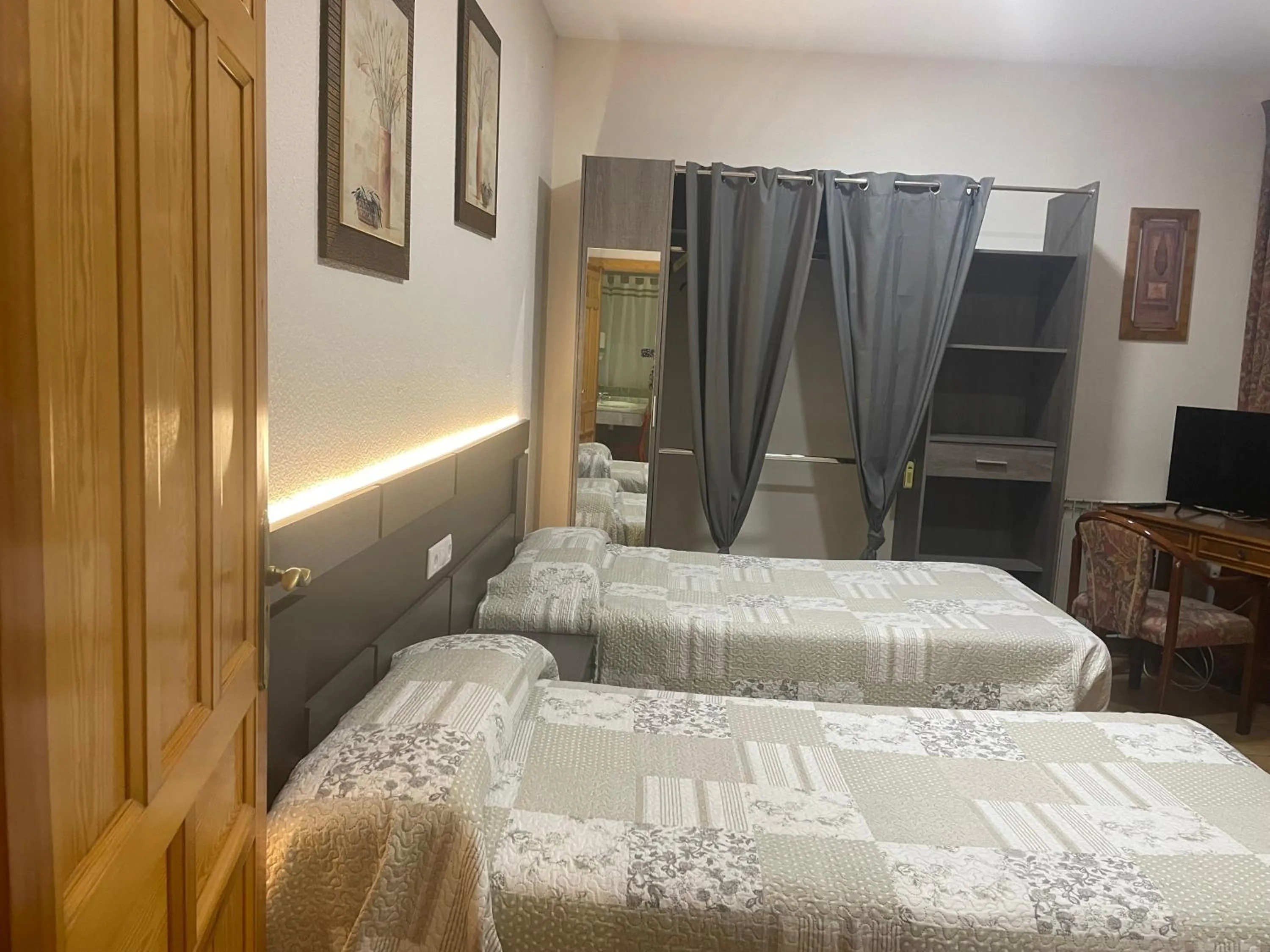 Photo of the whole room, Bed in Hostal Costa Azul