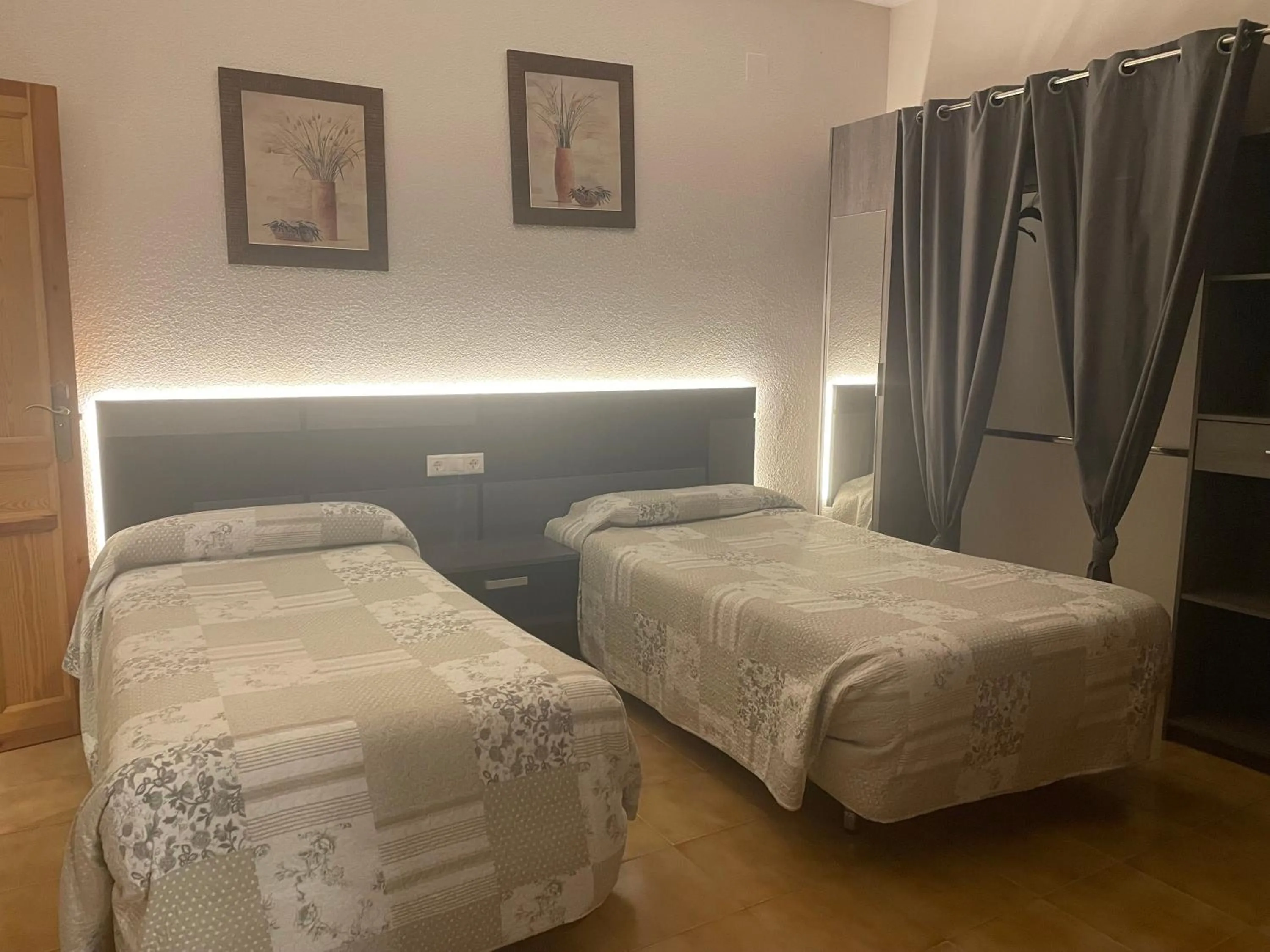 Photo of the whole room, Bed in Hostal Costa Azul