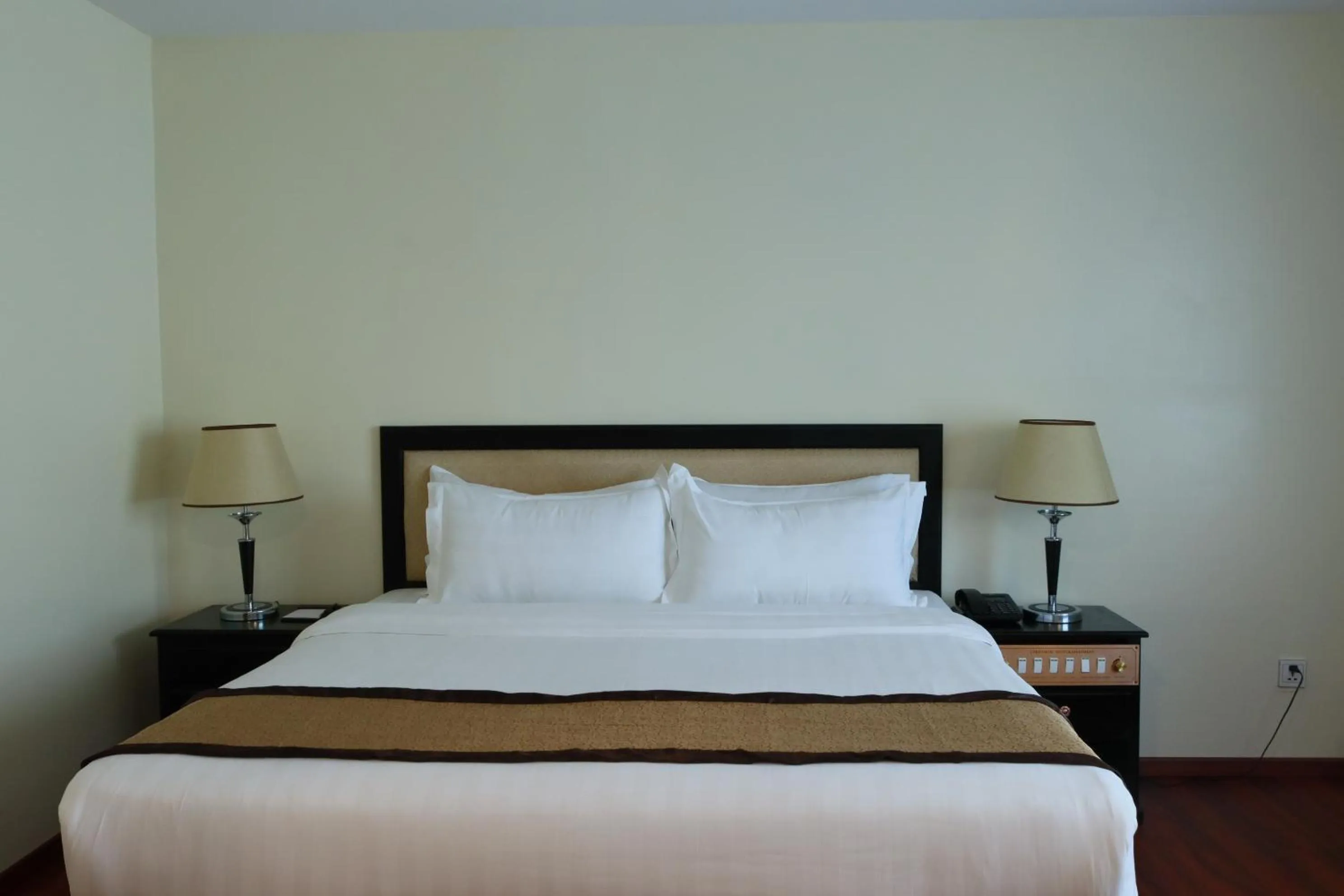 Bed in Mahasakor Inn