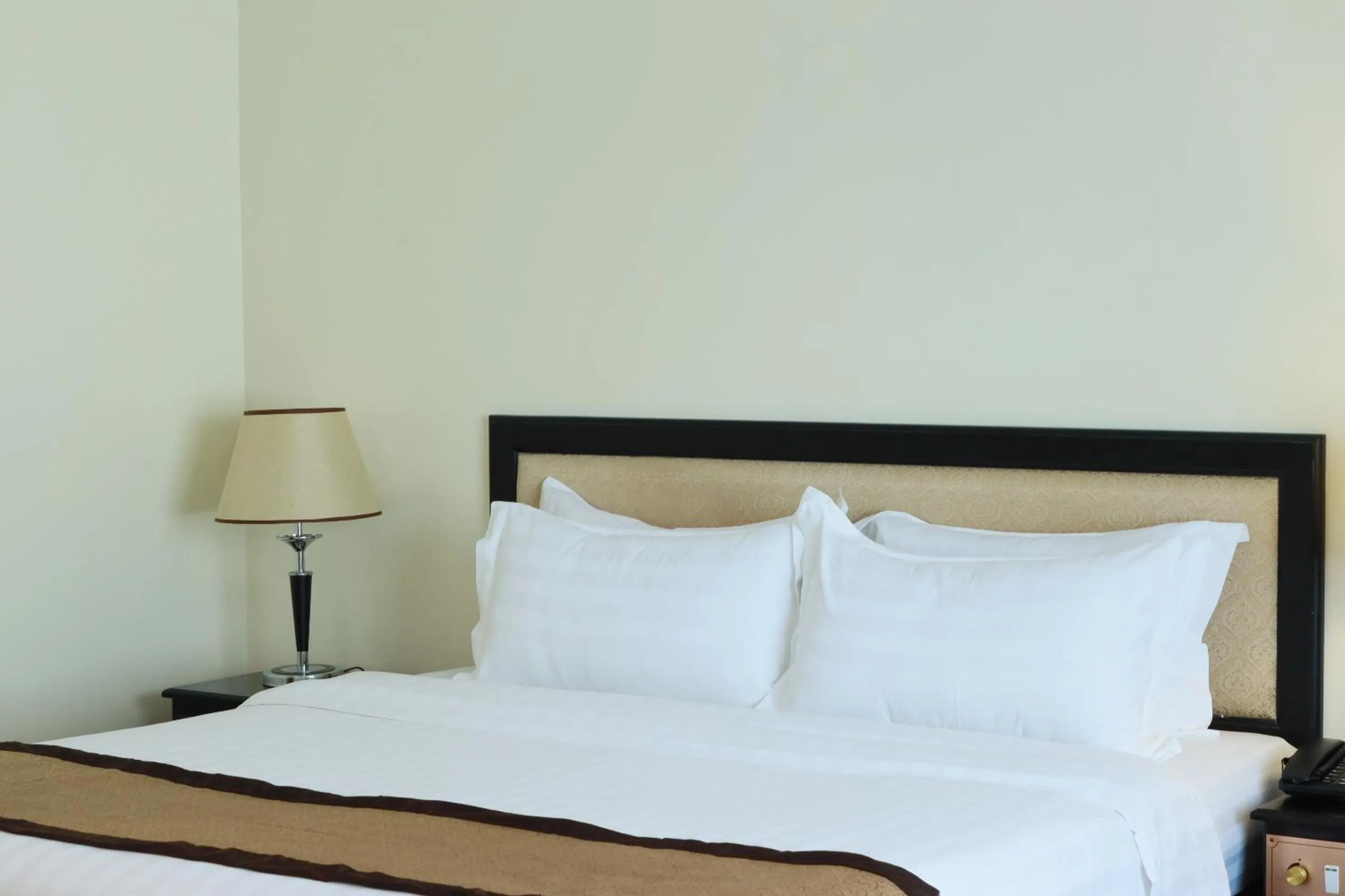 Bed in Mahasakor Inn