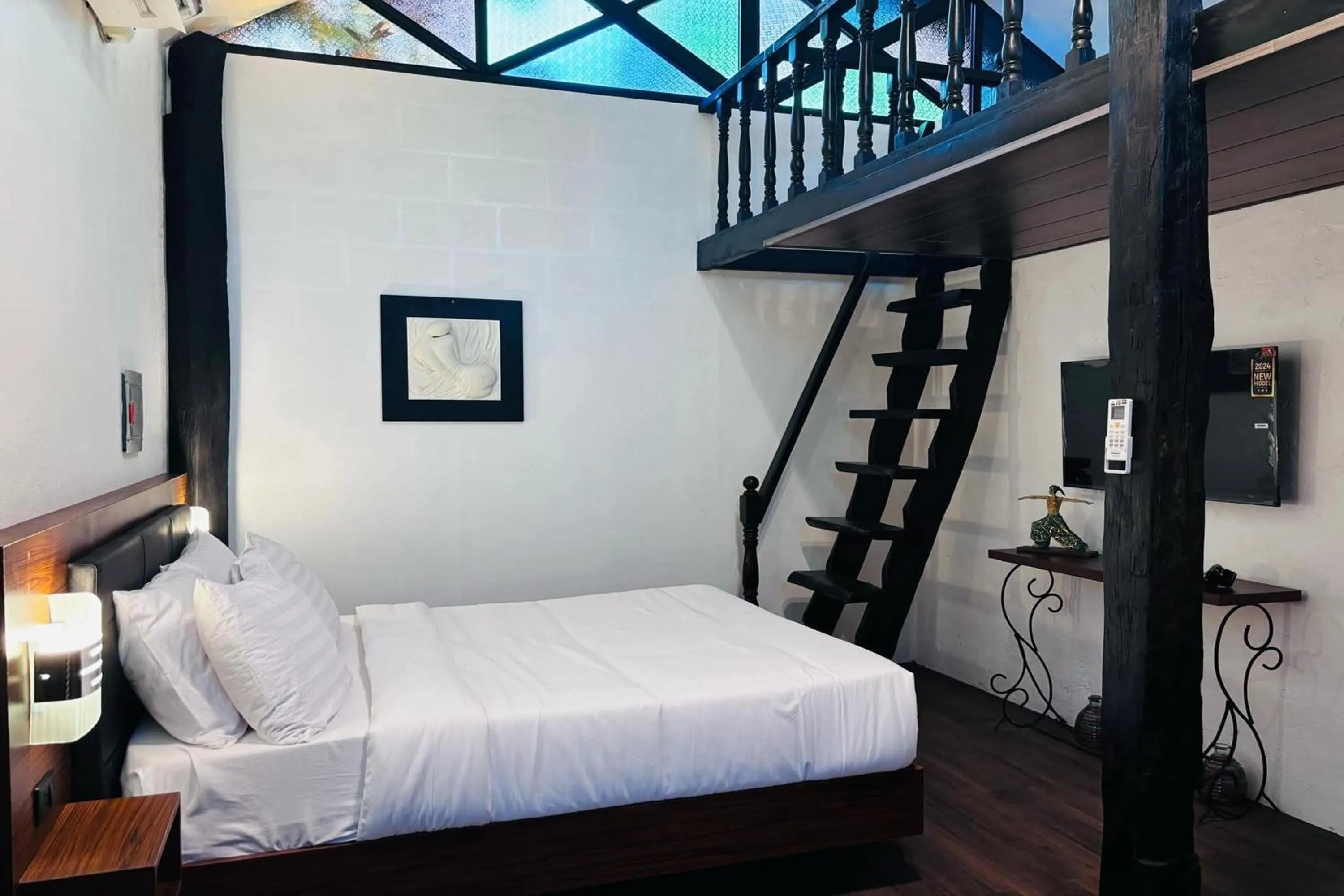 Bed in Ilocos Urban Wave Resort