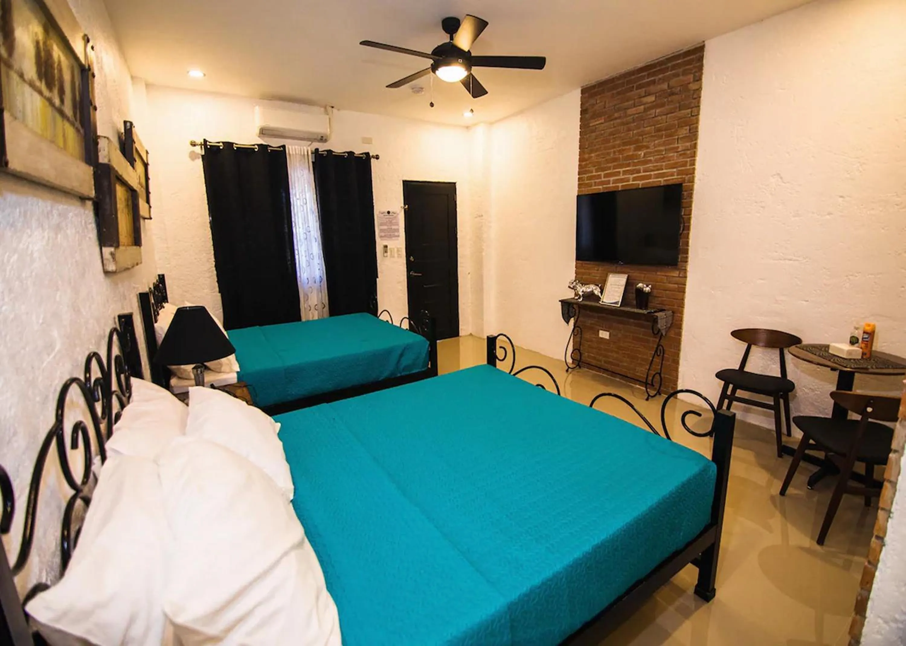 Bed in Ilocos Urban Wave Resort