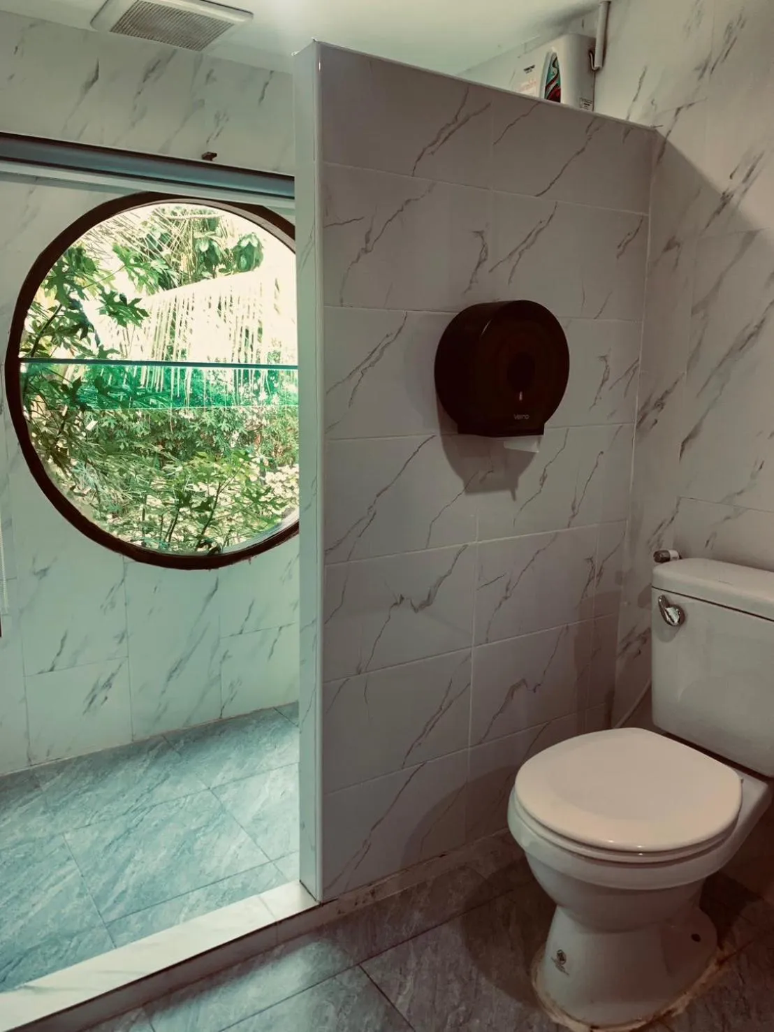 Bathroom in Andaman Beach Resort by Zodiac
