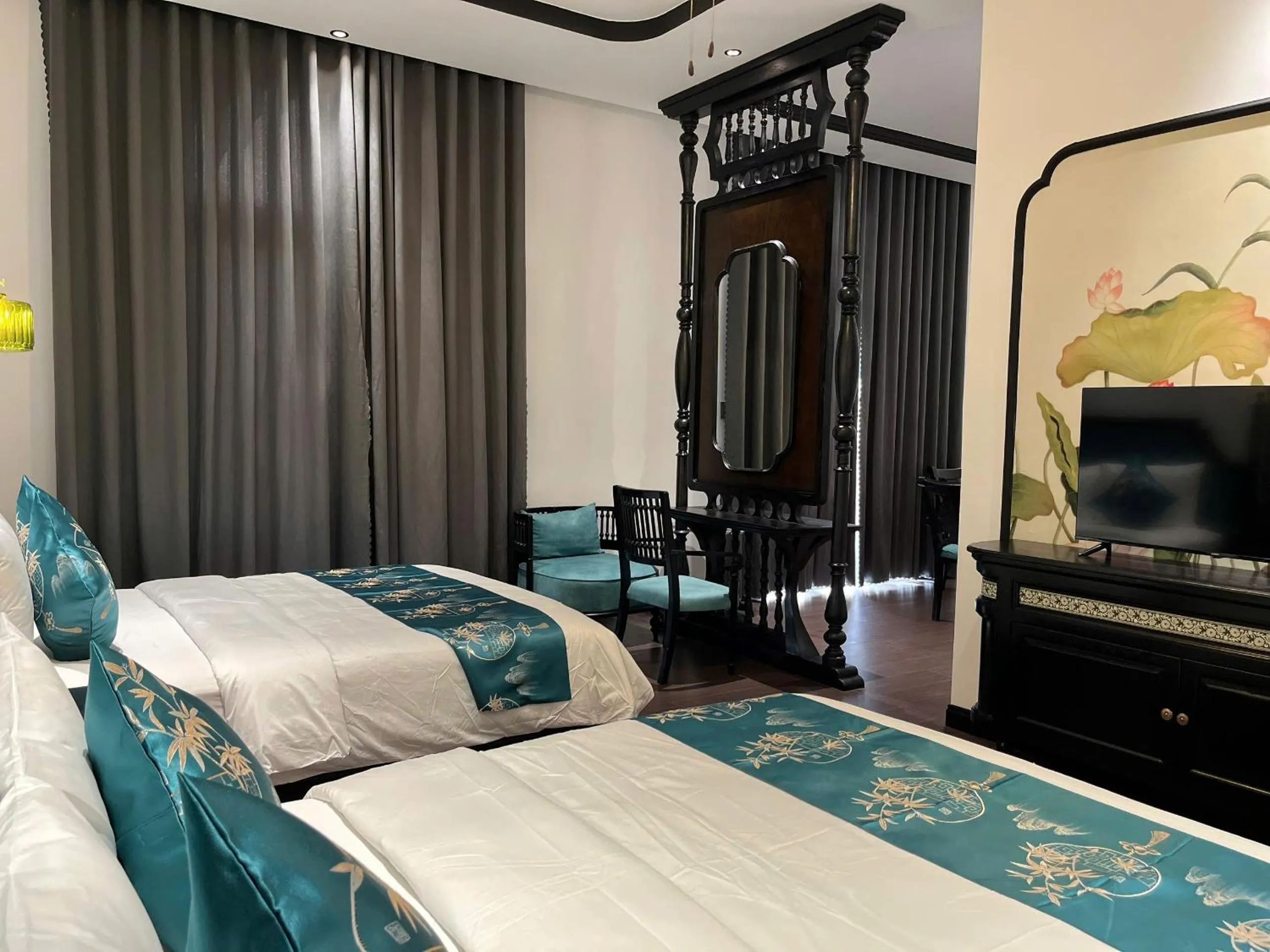 Bed in MAISON CAMELLIA Hotel