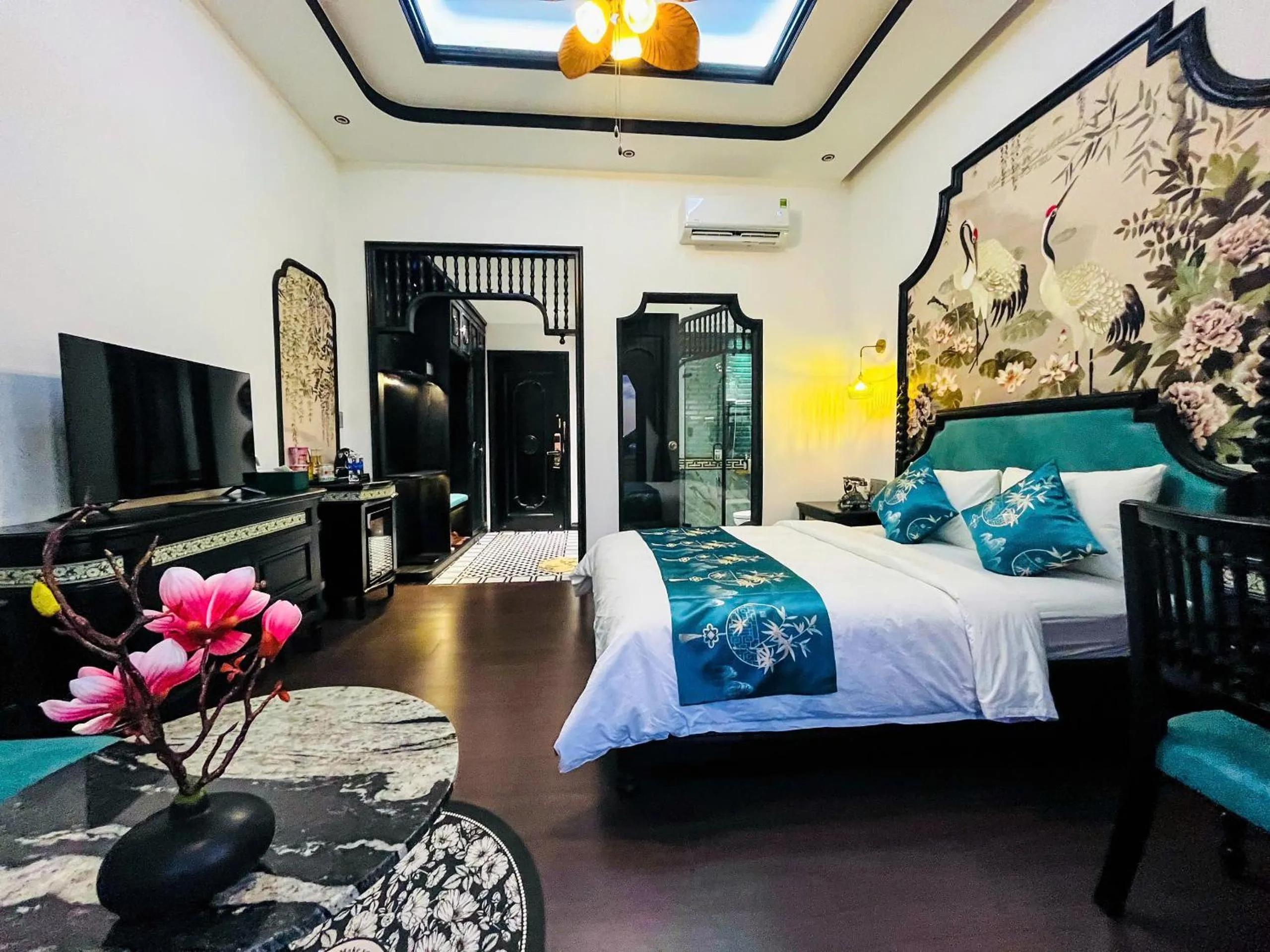 Bed in MAISON CAMELLIA Hotel