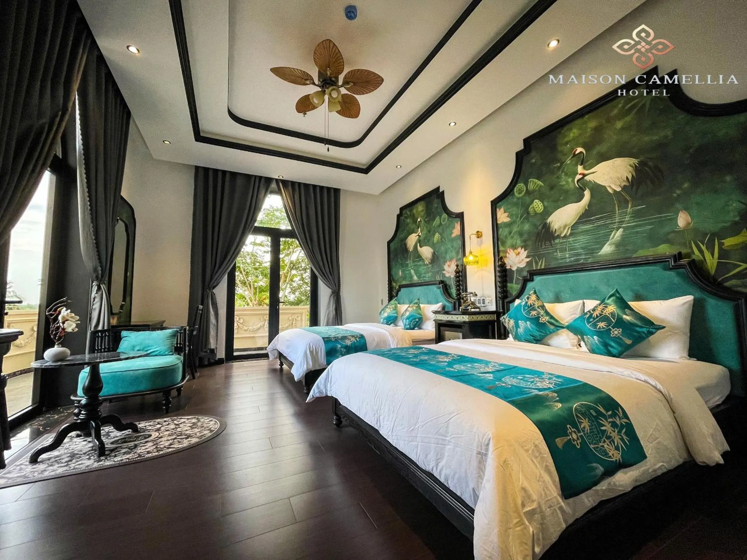 Bed in MAISON CAMELLIA Hotel