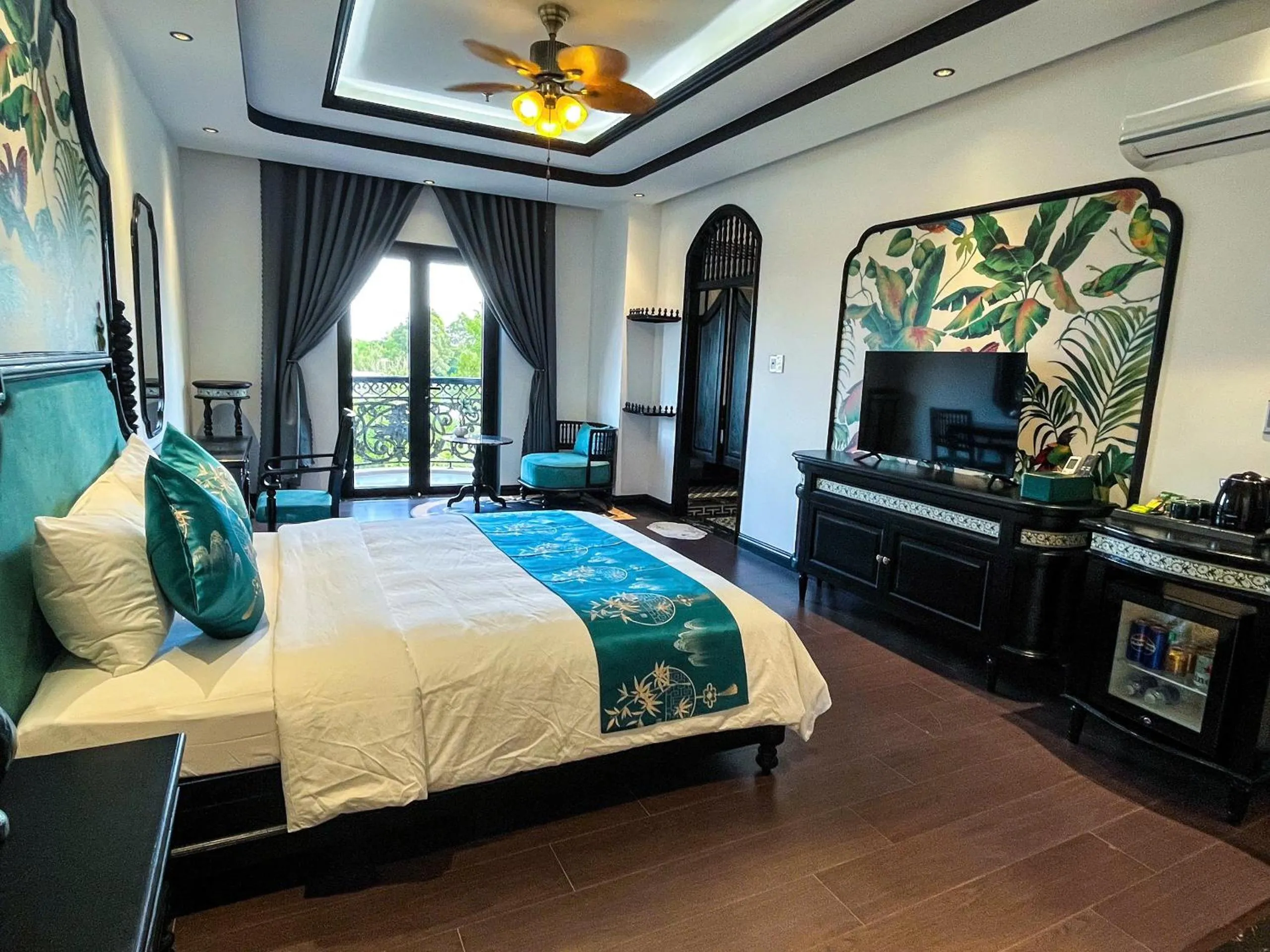 Bed in MAISON CAMELLIA Hotel