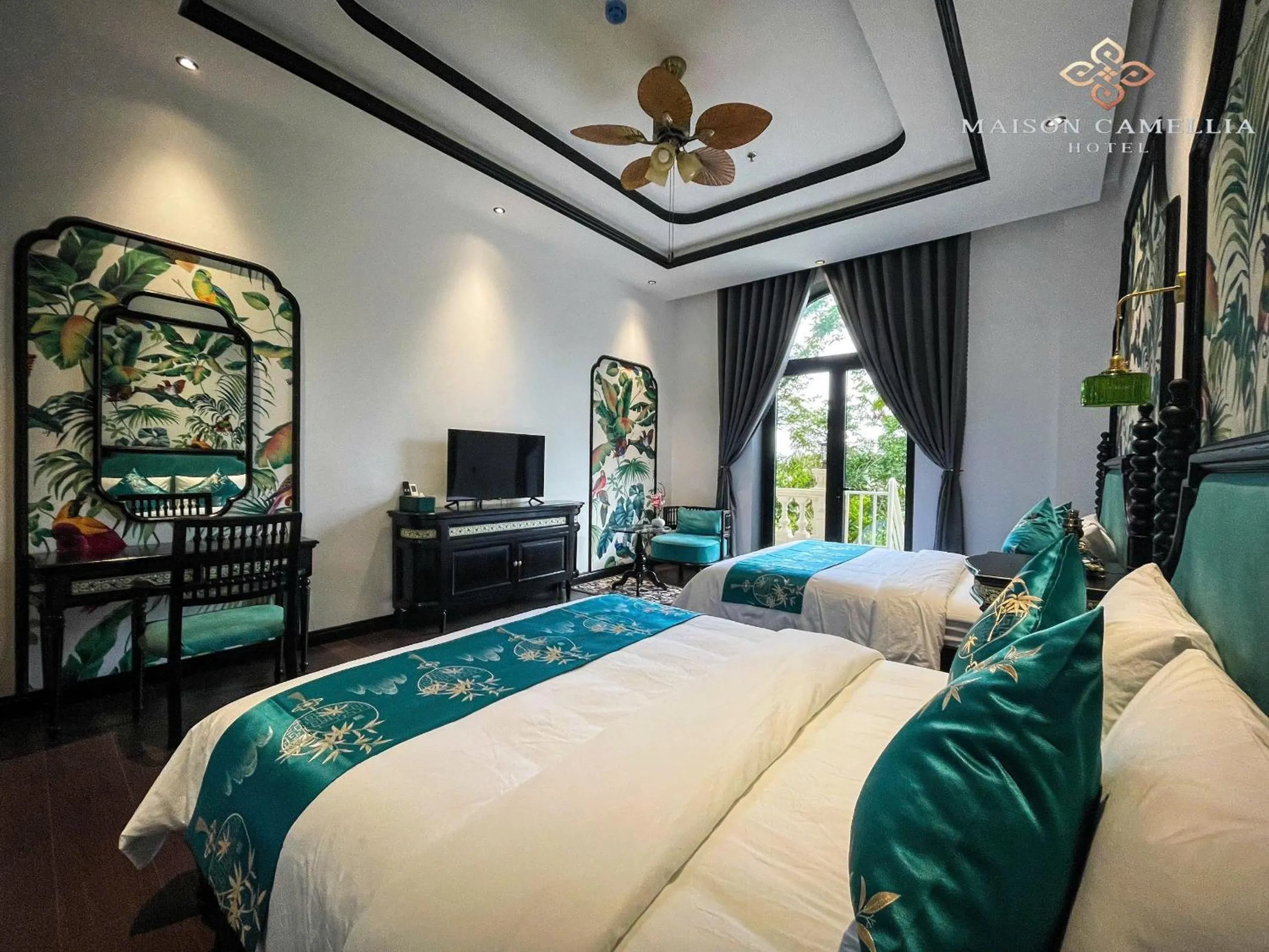 Bed in MAISON CAMELLIA Hotel