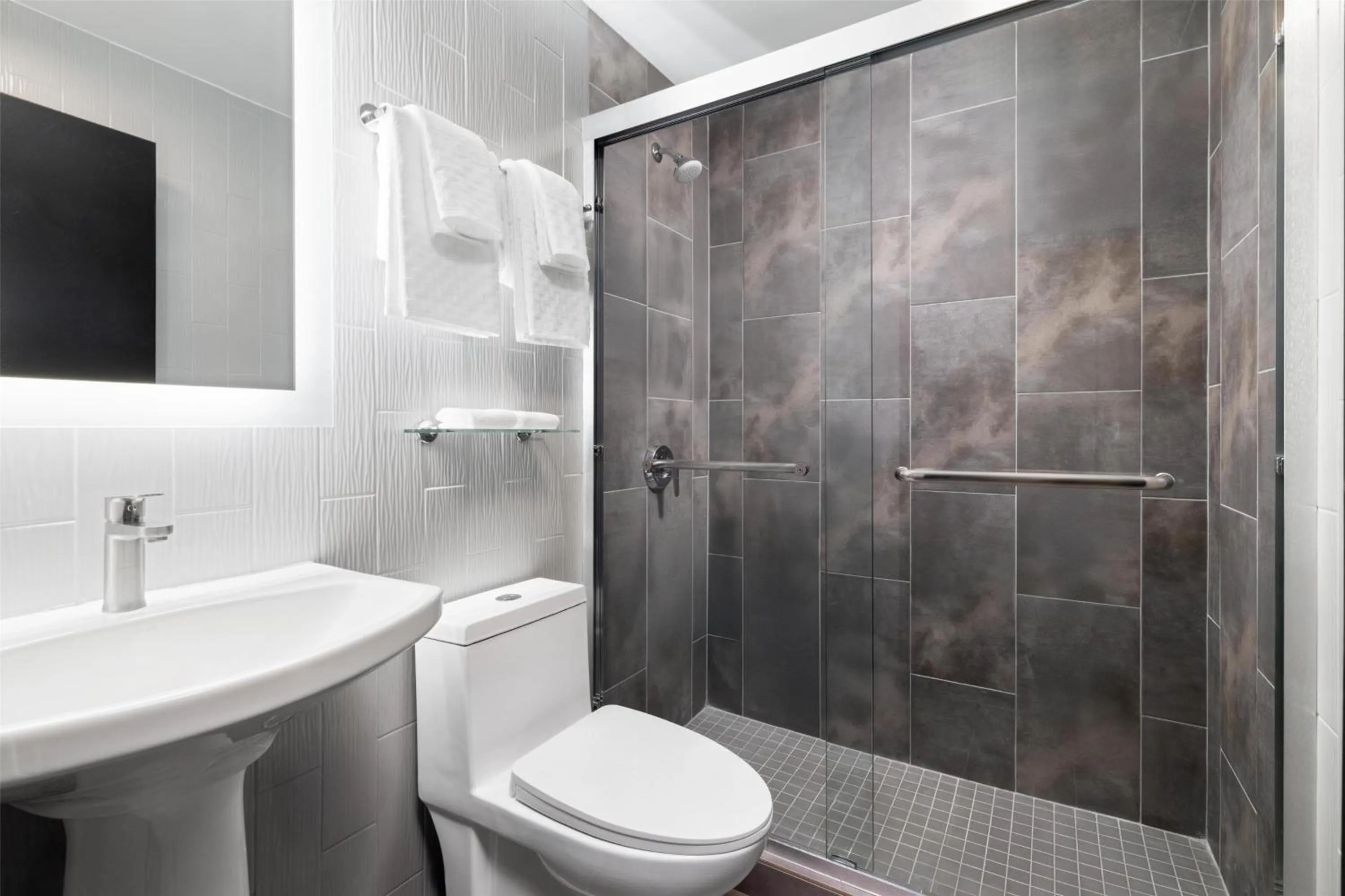 Bathroom in GLō Best Western Bronx NYC