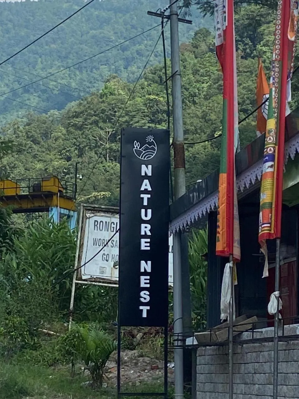 Property logo or sign in Nature's Nest Resort