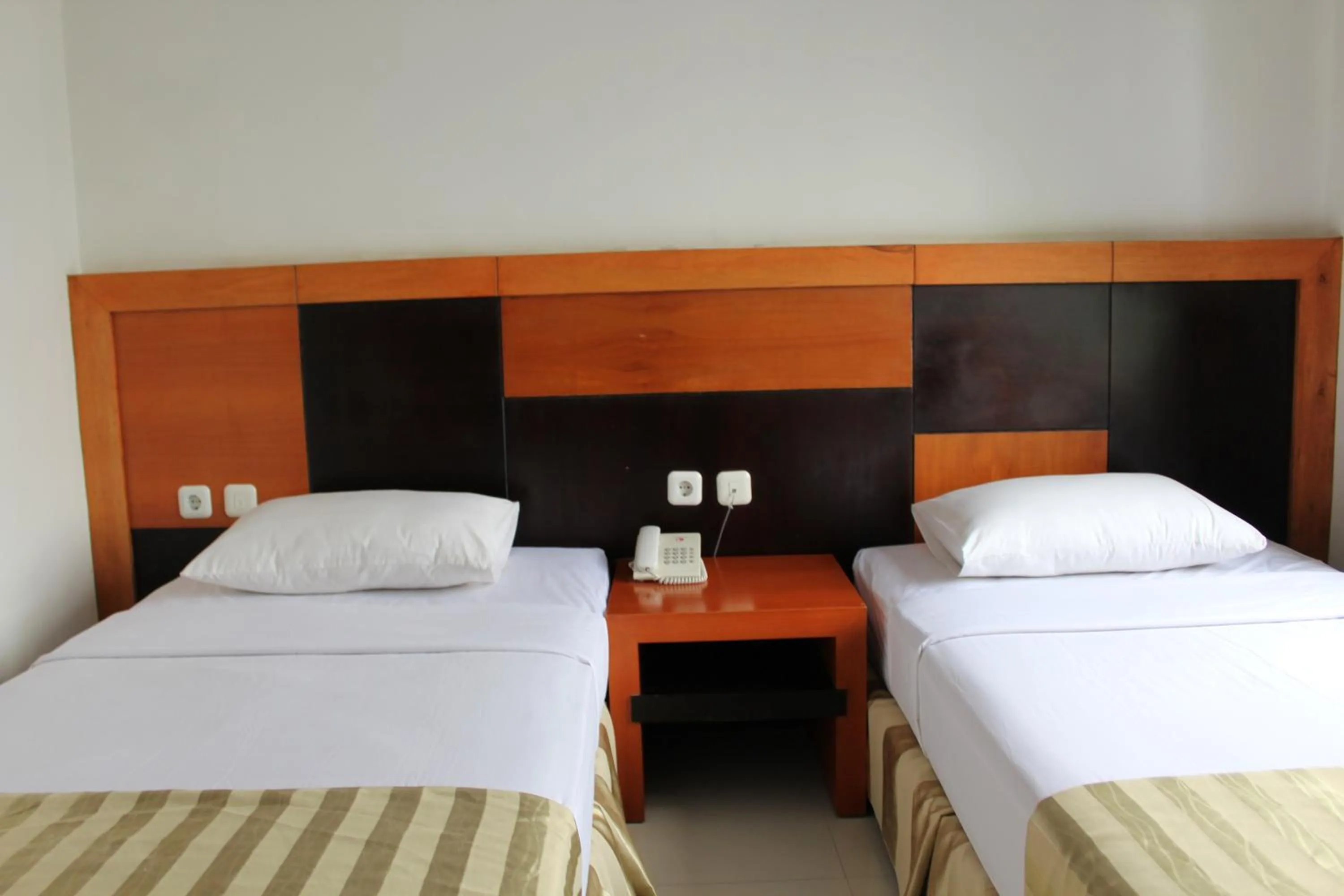 Bed in Hotel Grand Karawang Indah