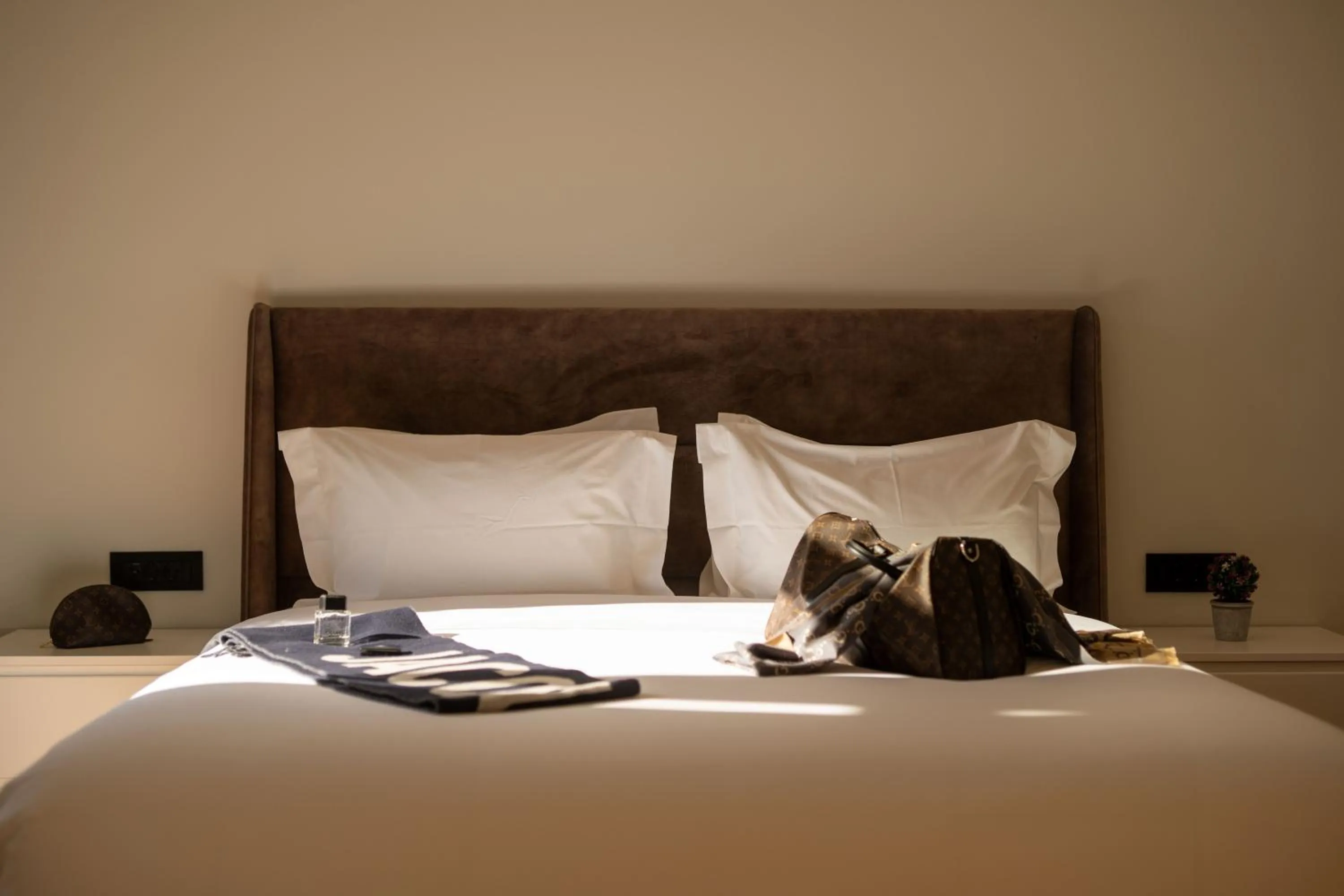 Bed in Whisper Athens Suites
